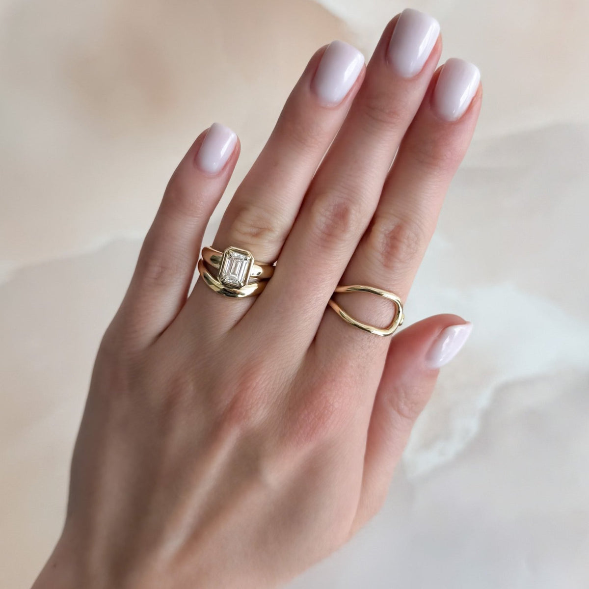 Club Ring Solitaire Engagement Ring With an Emerald Cut Diamond - GOODSTONE