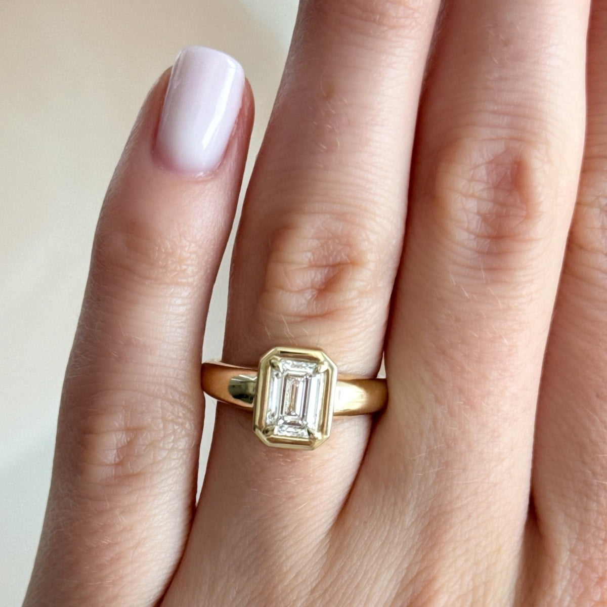 Club Ring Solitaire Engagement Ring With an Emerald Cut Diamond - GOODSTONE