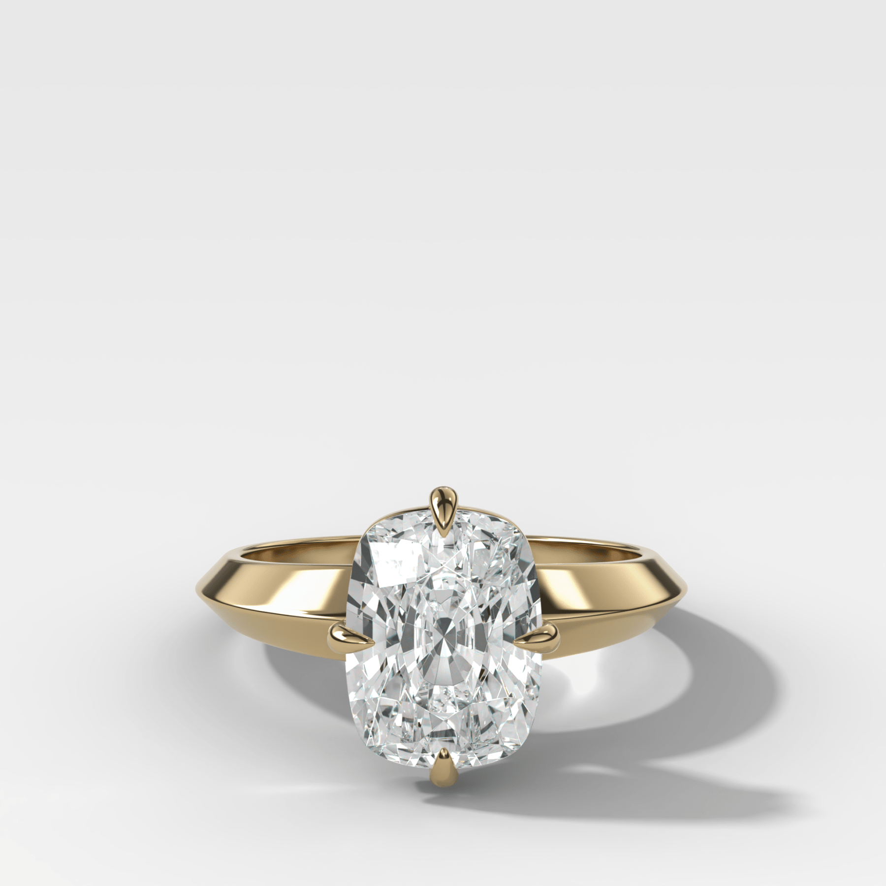 Compass Tapered Butter Knife Finest Solitaire Engagement Ring With a Cushion Cut Diamond - GOODSTONE
