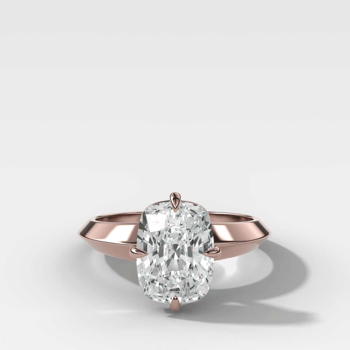 Compass Tapered Butter Knife Finest Solitaire Engagement Ring With a Cushion Cut Diamond - GOODSTONE