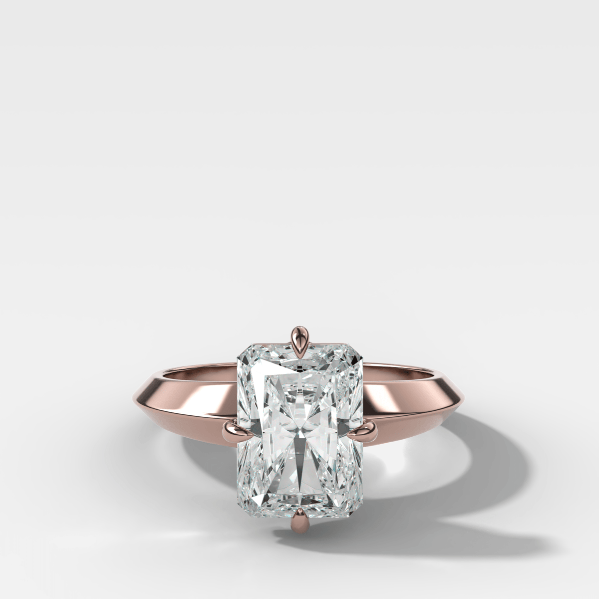 Compass Tapered Butter Knife Finest Solitaire Engagement Ring With an Elongated Radiant Cut Diamond - GOODSTONE