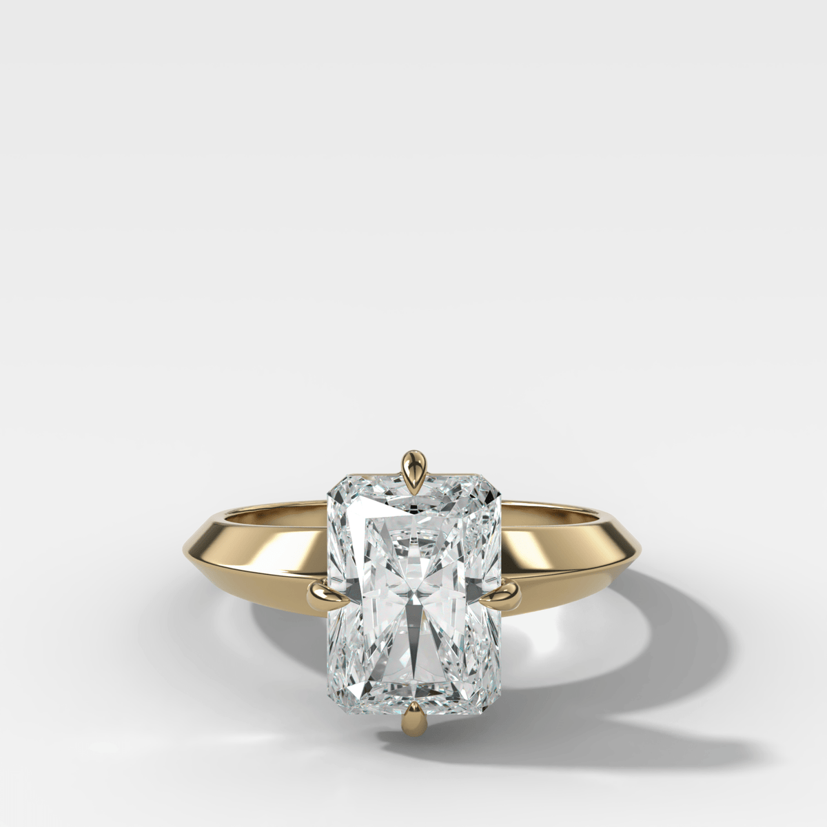 Compass Tapered Butter Knife Finest Solitaire Engagement Ring With an Elongated Radiant Cut Diamond - GOODSTONE