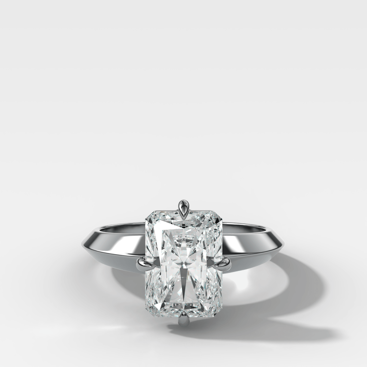 Compass Tapered Butter Knife Finest Solitaire Engagement Ring With an Elongated Radiant Cut Diamond - GOODSTONE
