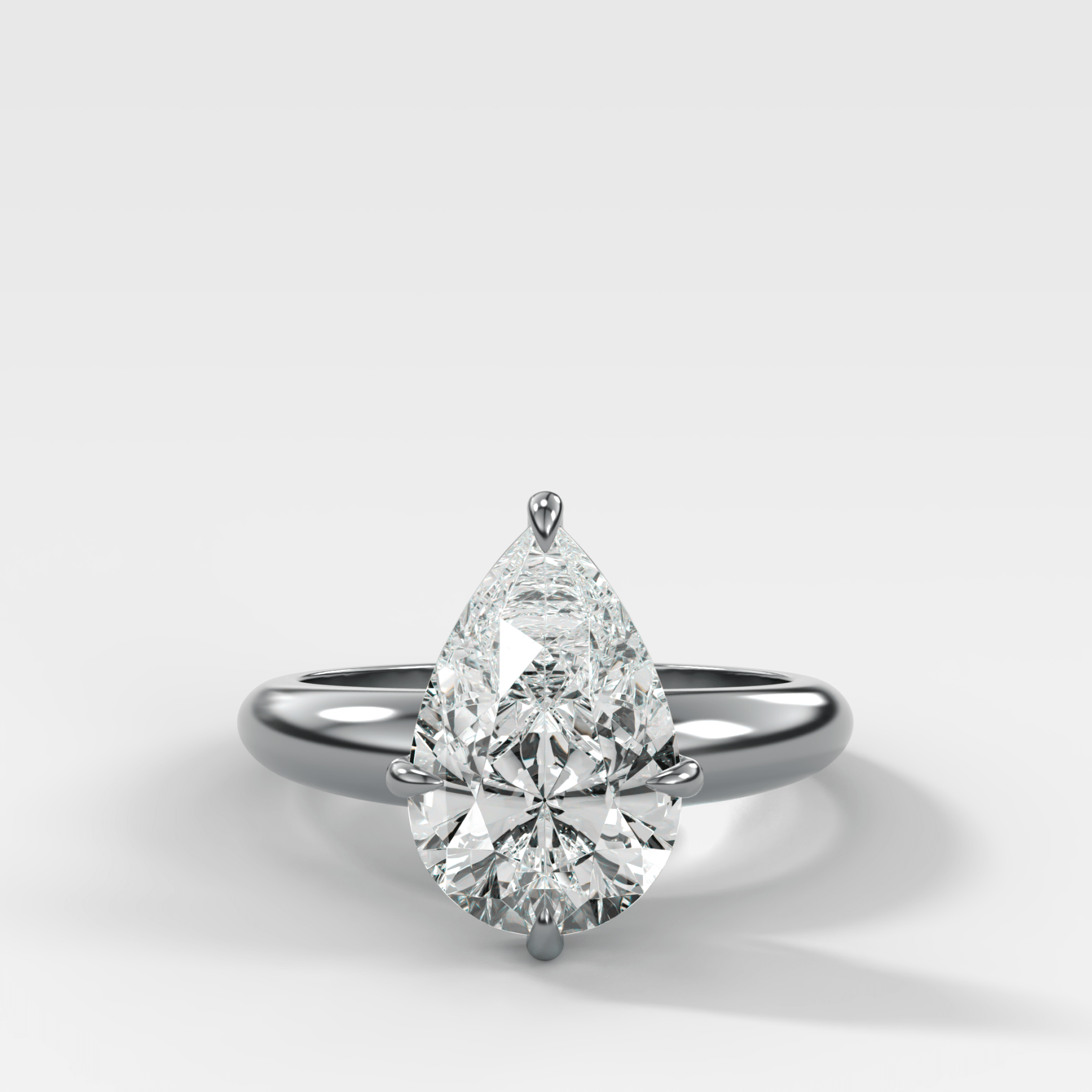 Compass Tapered Dome Engagement Ring With a Pear Diamond - GOODSTONE
