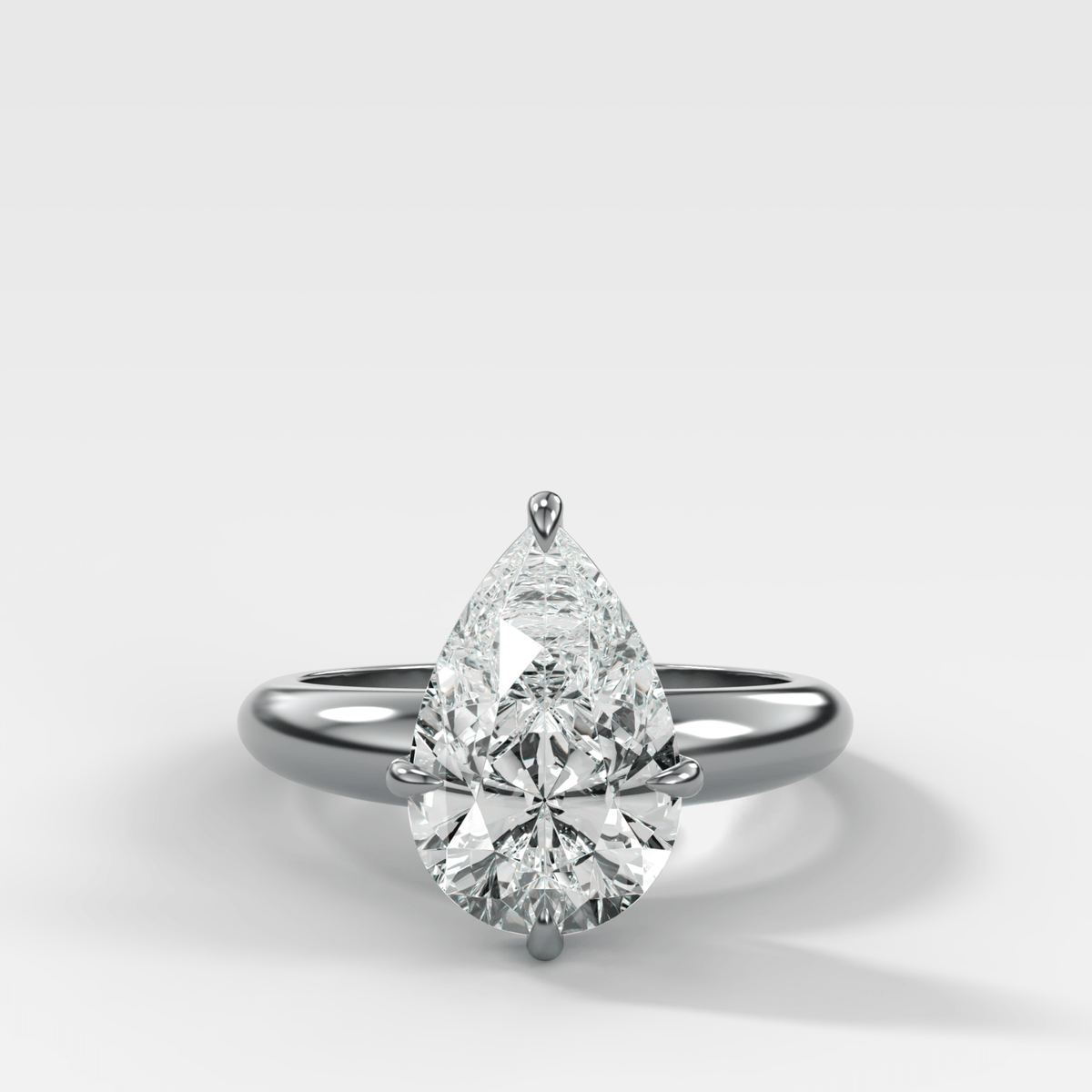 Compass Tapered Dome Engagement Ring With a Pear Diamond - GOODSTONE
