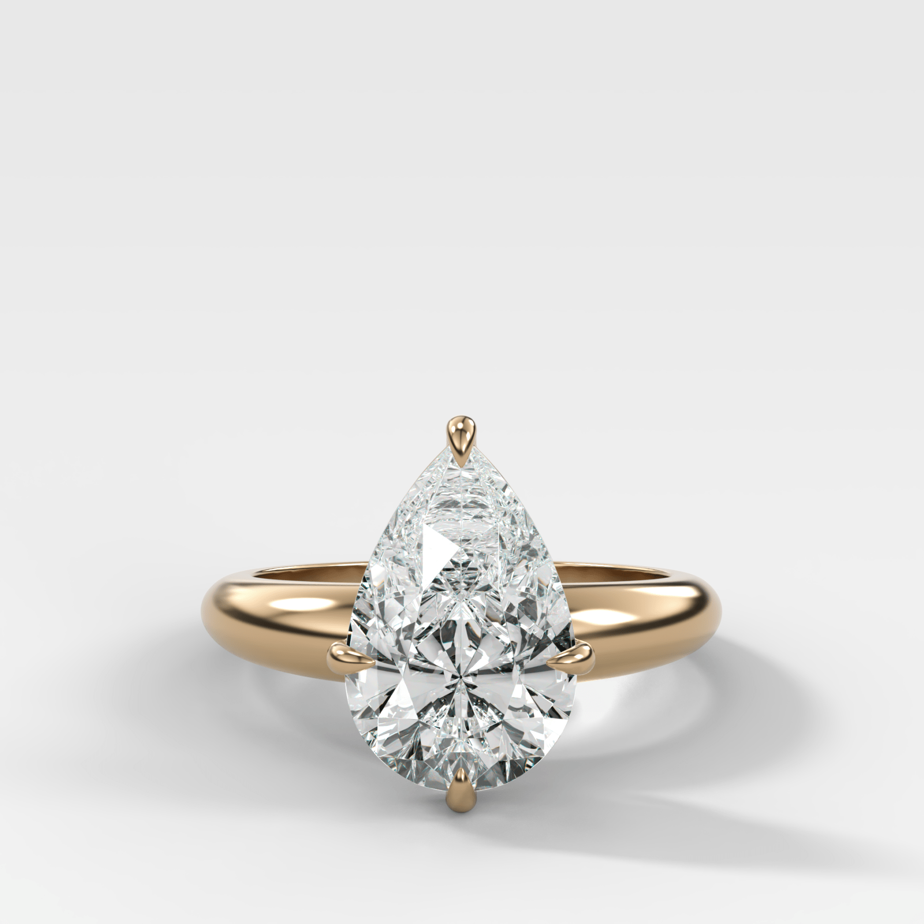 Compass Tapered Dome Engagement Ring With a Pear Diamond - GOODSTONE