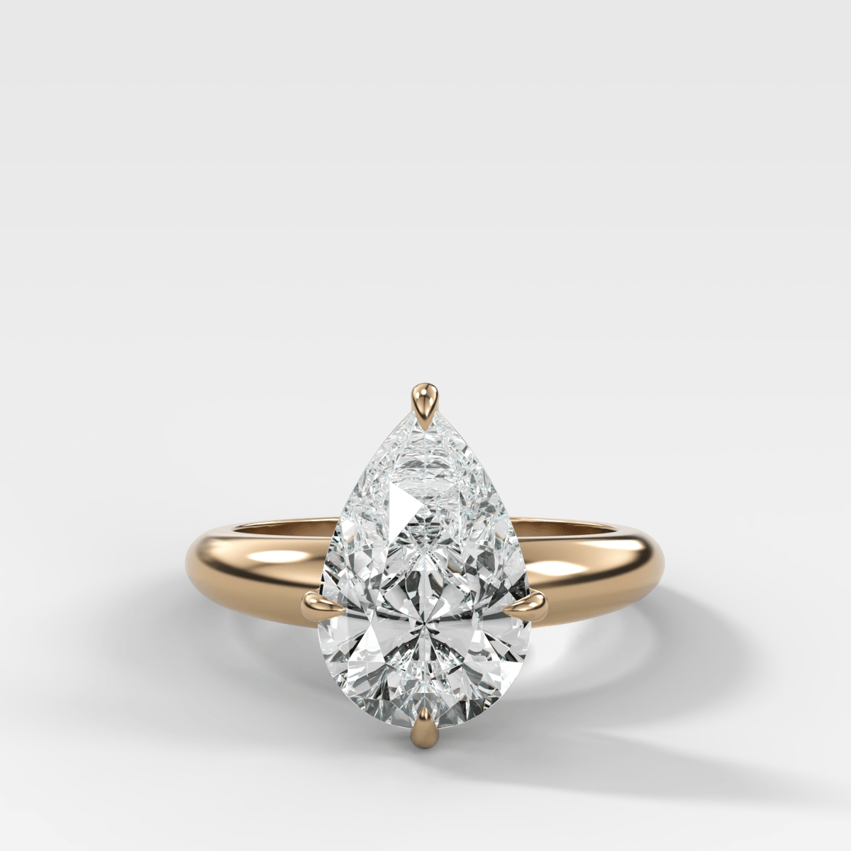 Compass Tapered Dome Engagement Ring With a Pear Diamond - GOODSTONE