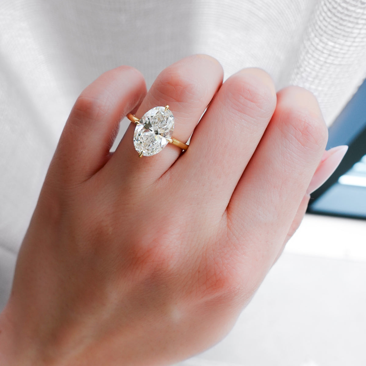 Compass Solitaire Engagement Ring with Oval Cut Diamond