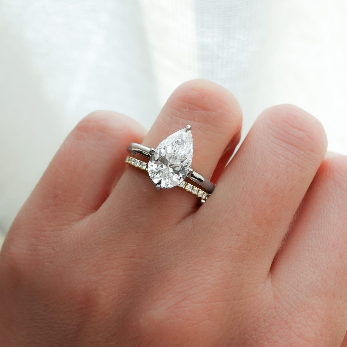 Compass Solitaire Engagement Ring with Pear Cut Diamond