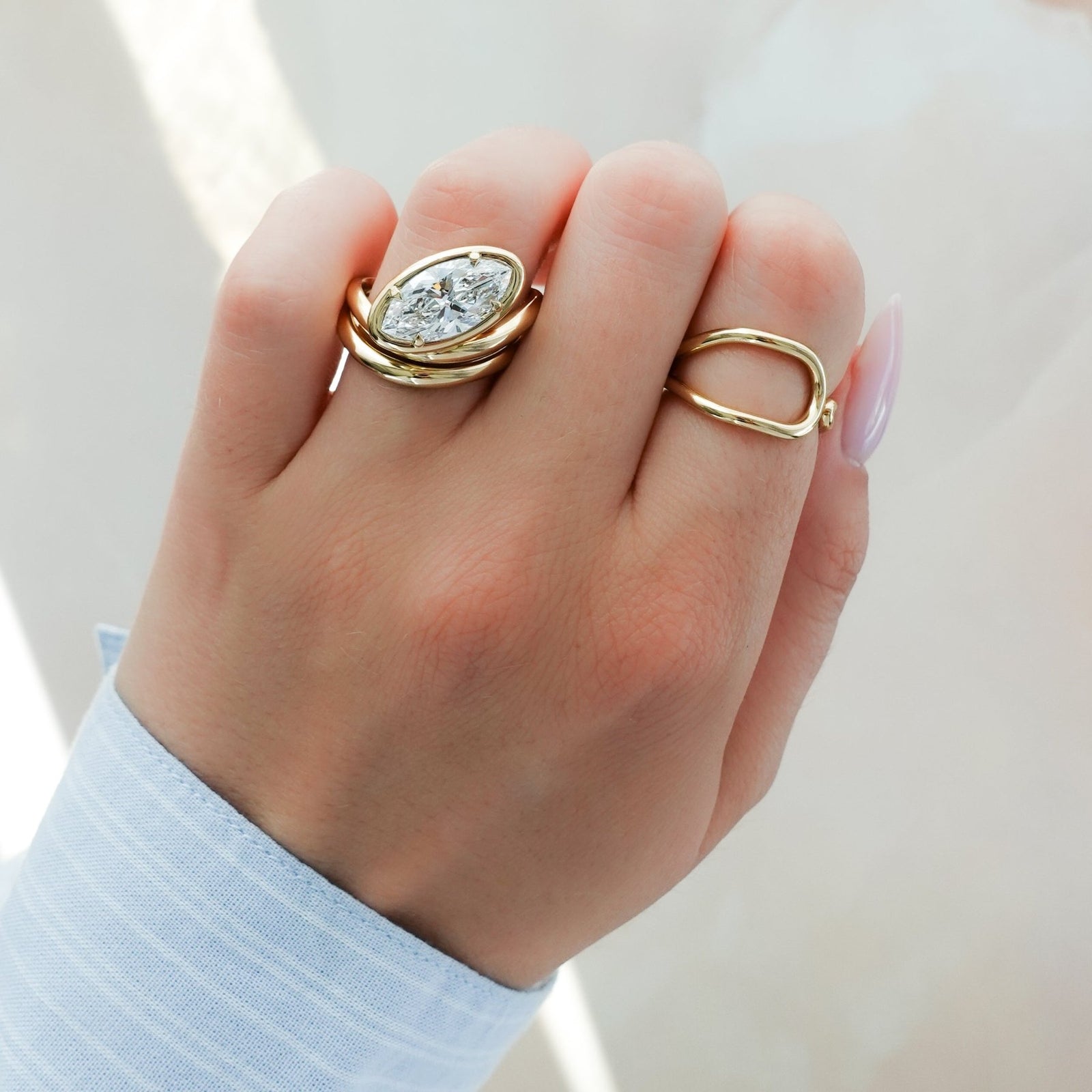 Contoured Club Engagement Ring with a Marquise Cut Diamond - GOODSTONE
