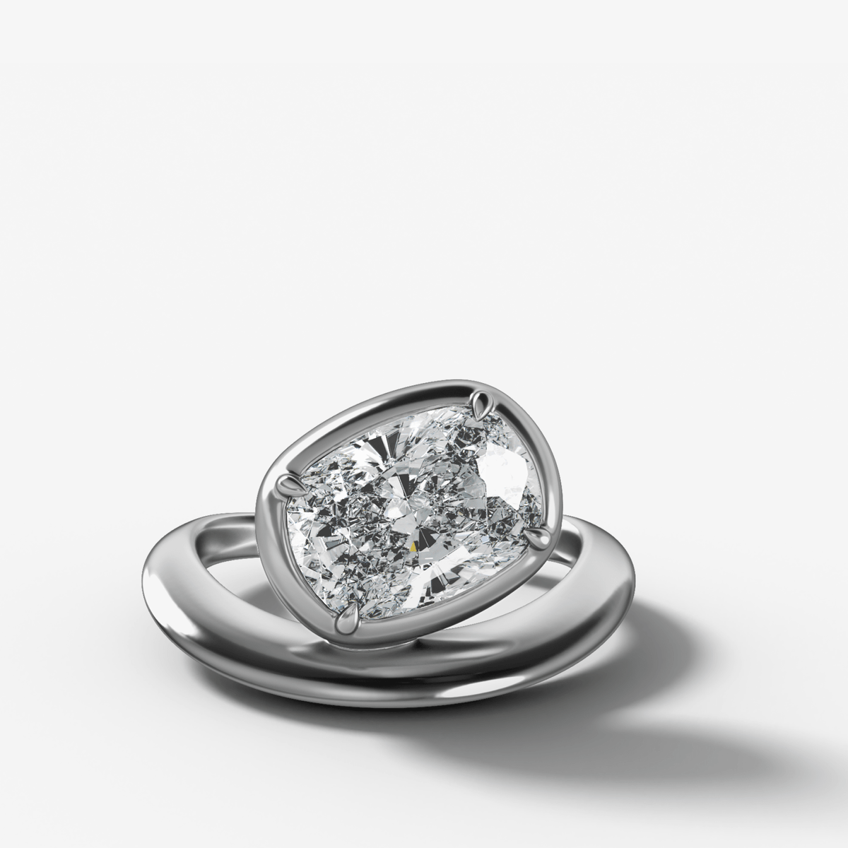 Contoured Club Engagement Ring with an Elongated Cushion Cut Diamond - GOODSTONE