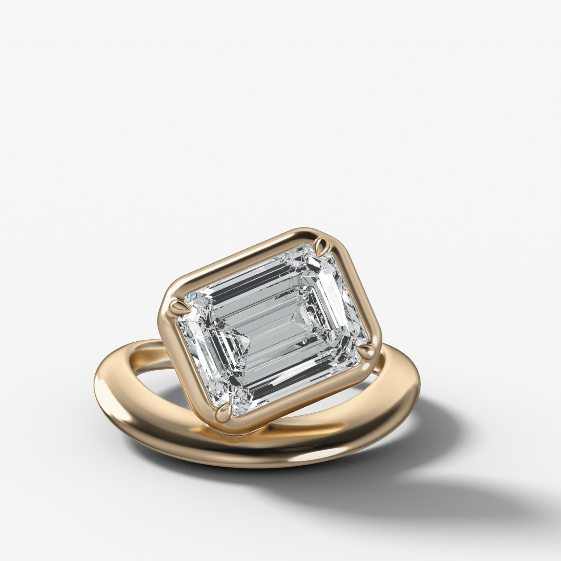 Contoured Club Engagement Ring with an Emerald Cut Diamond - GOODSTONE
