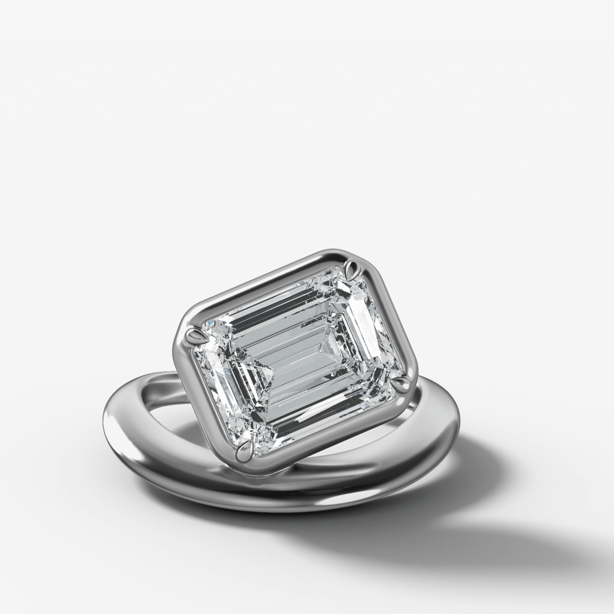 Contoured Club Engagement Ring with an Emerald Cut Diamond - GOODSTONE