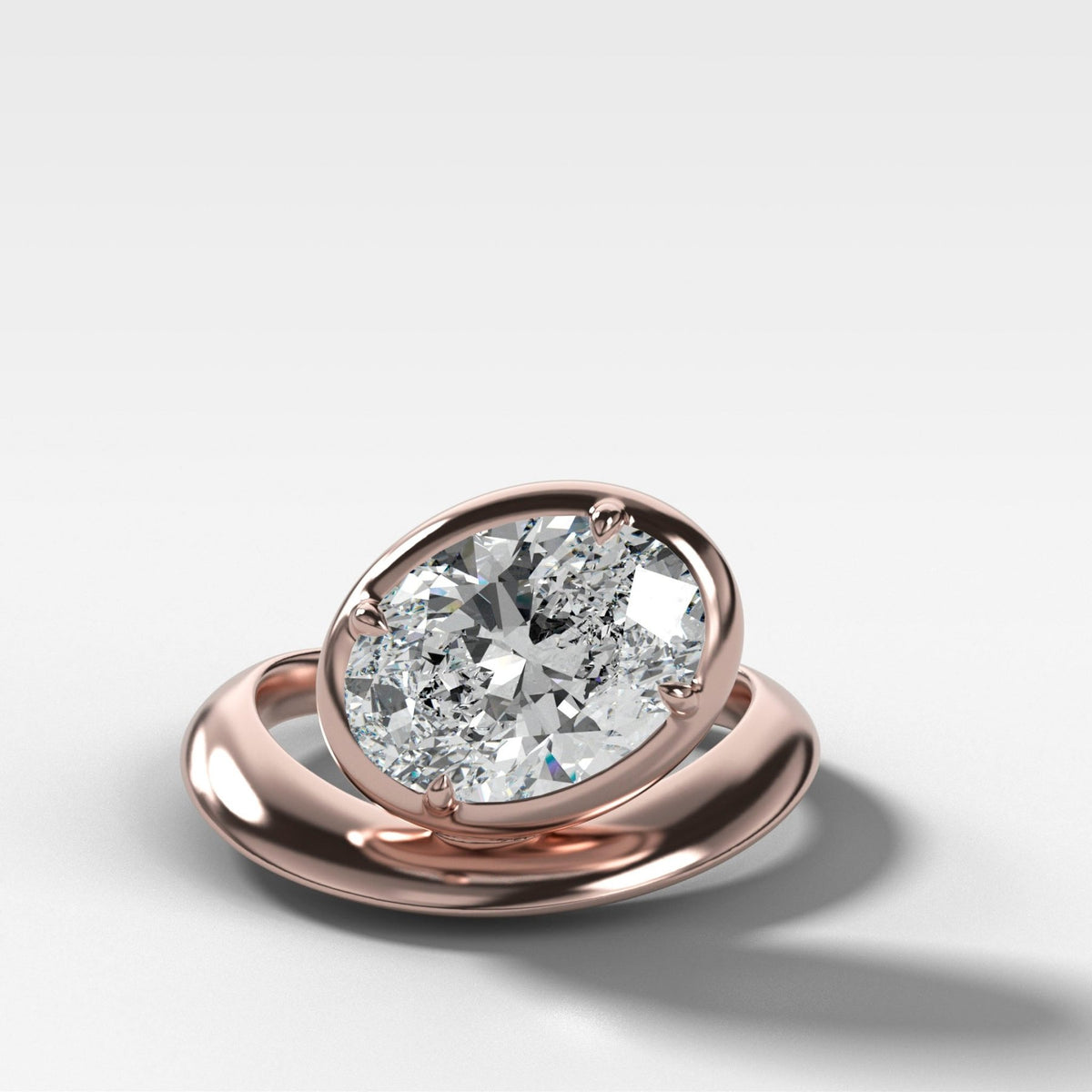 Contoured Club Engagement Ring with an Oval Cut Diamond - GOODSTONE