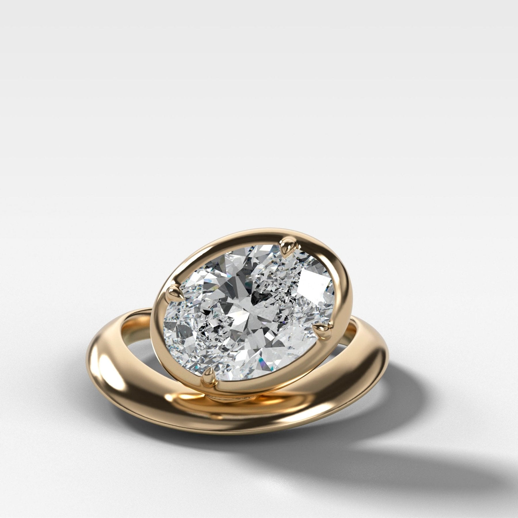 Contoured Club Engagement Ring with an Oval Cut Diamond - GOODSTONE