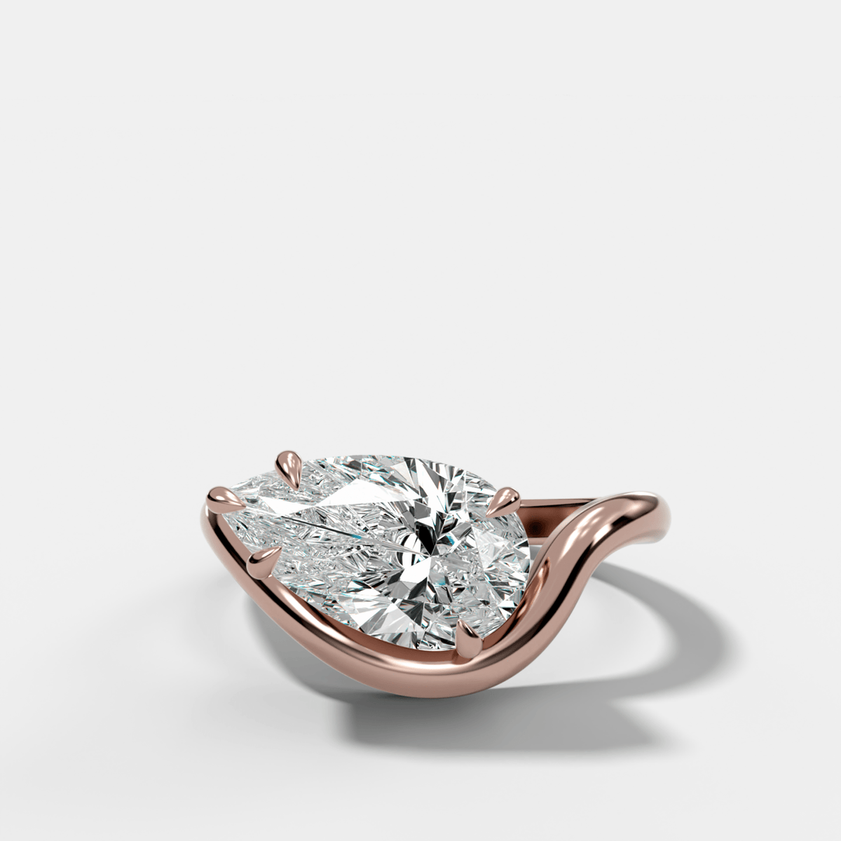 Contoured Engagement Ring with a Pear Cut Diamond - GOODSTONE