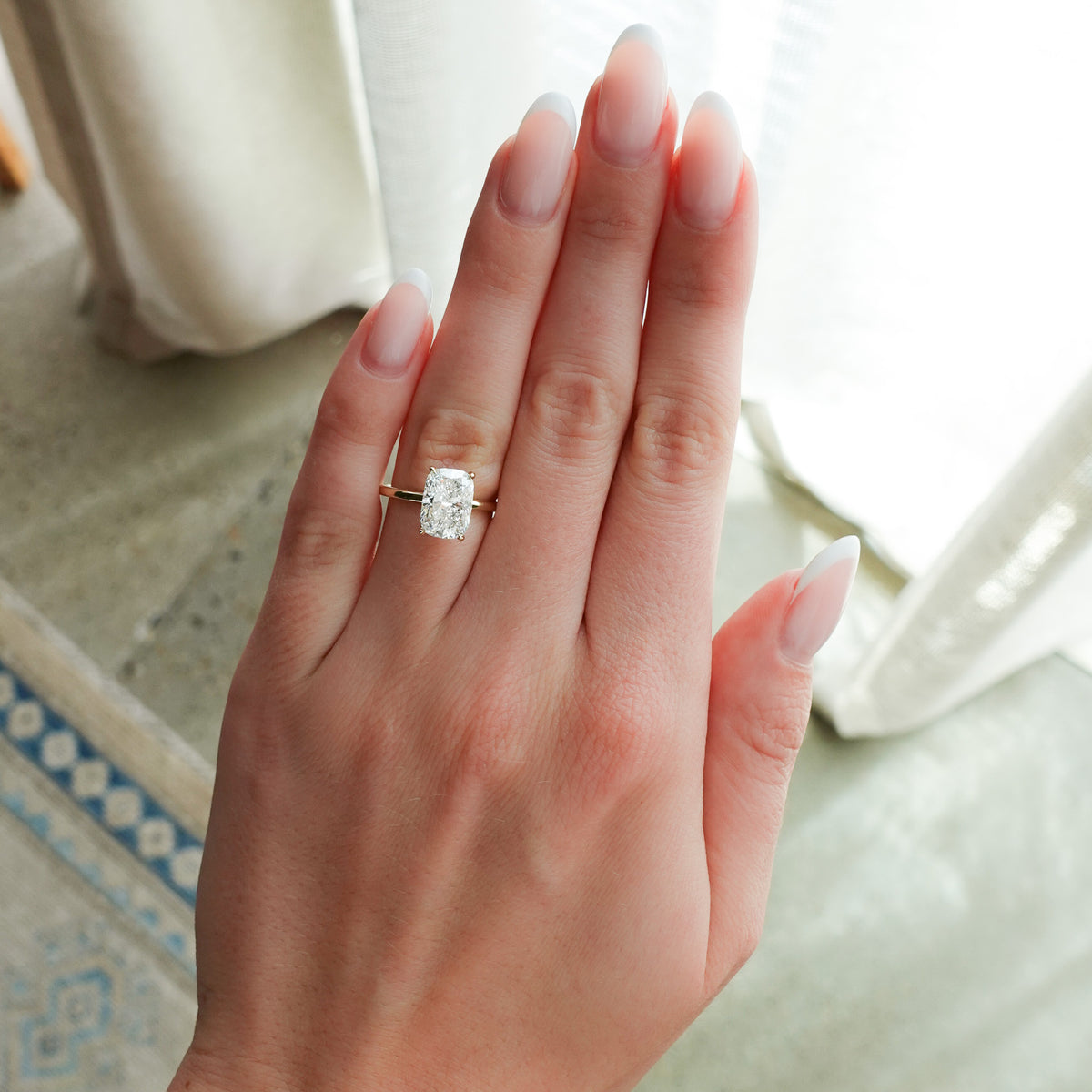 Crescent Solitaire Engagement Ring With Elongated Cushion Cut Diamond