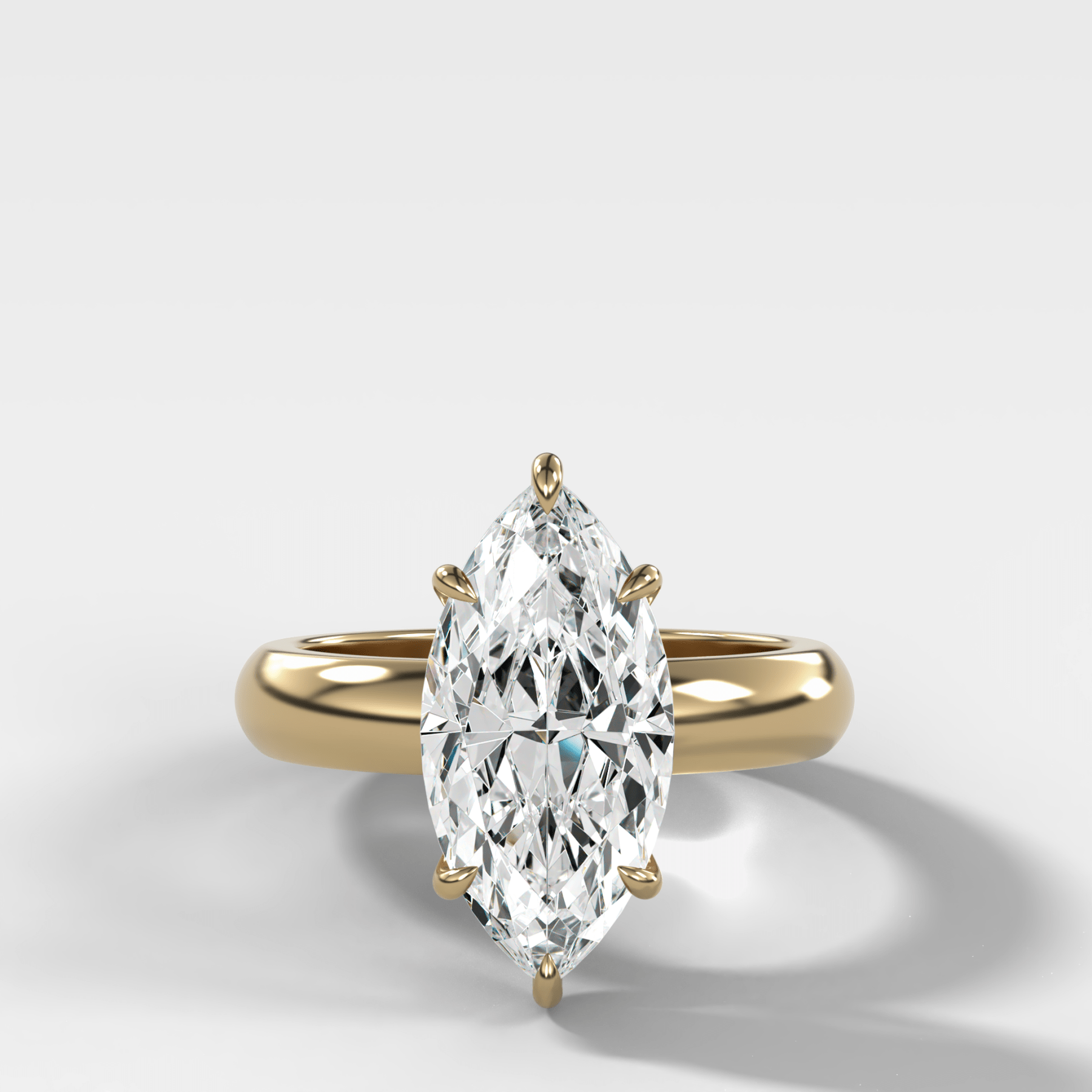 Domed Solitaire Engagement Ring with a Marquise Cut Diamond - GOODSTONE