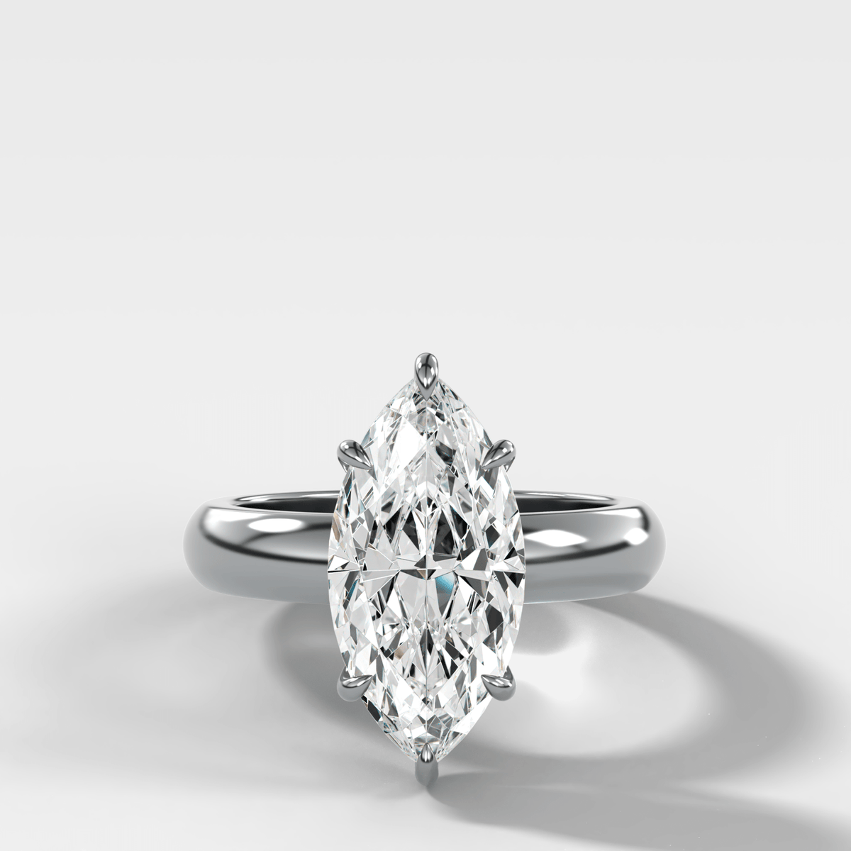 Domed Solitaire Engagement Ring with a Marquise Cut Diamond - GOODSTONE