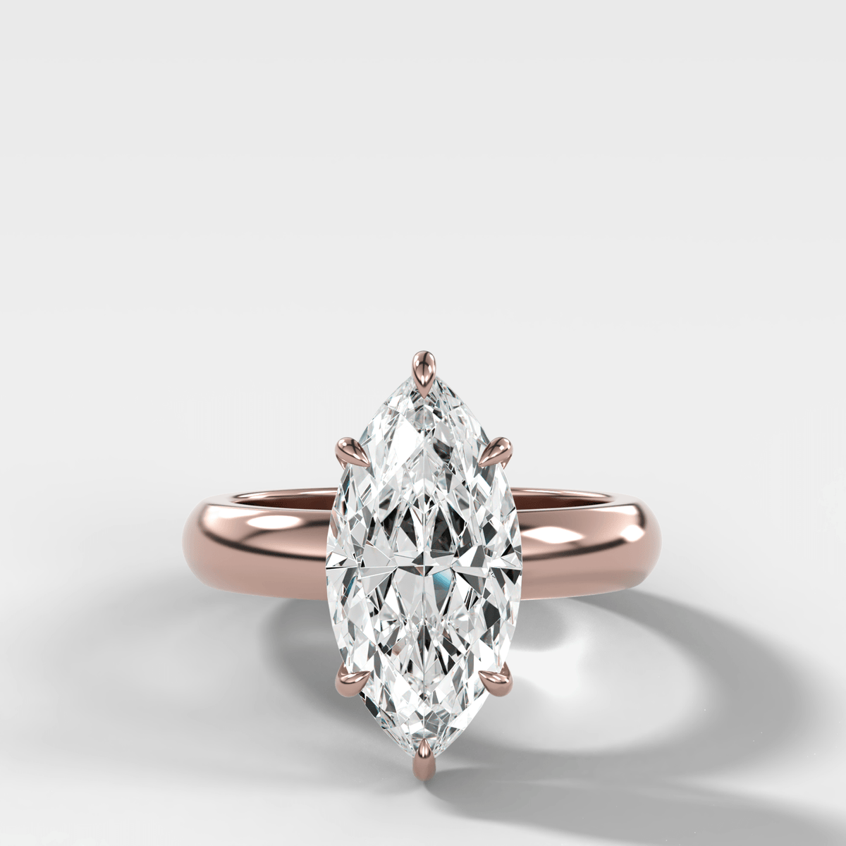Domed Solitaire Engagement Ring with a Marquise Cut Diamond - GOODSTONE
