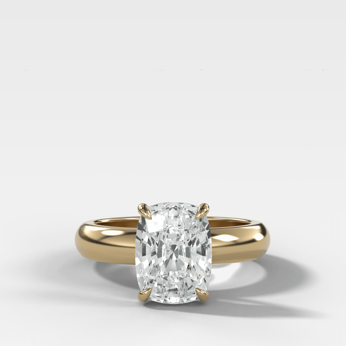 Domed Solitaire Engagement Ring with an Elongated Cushion Cut Diamond - GOODSTONE