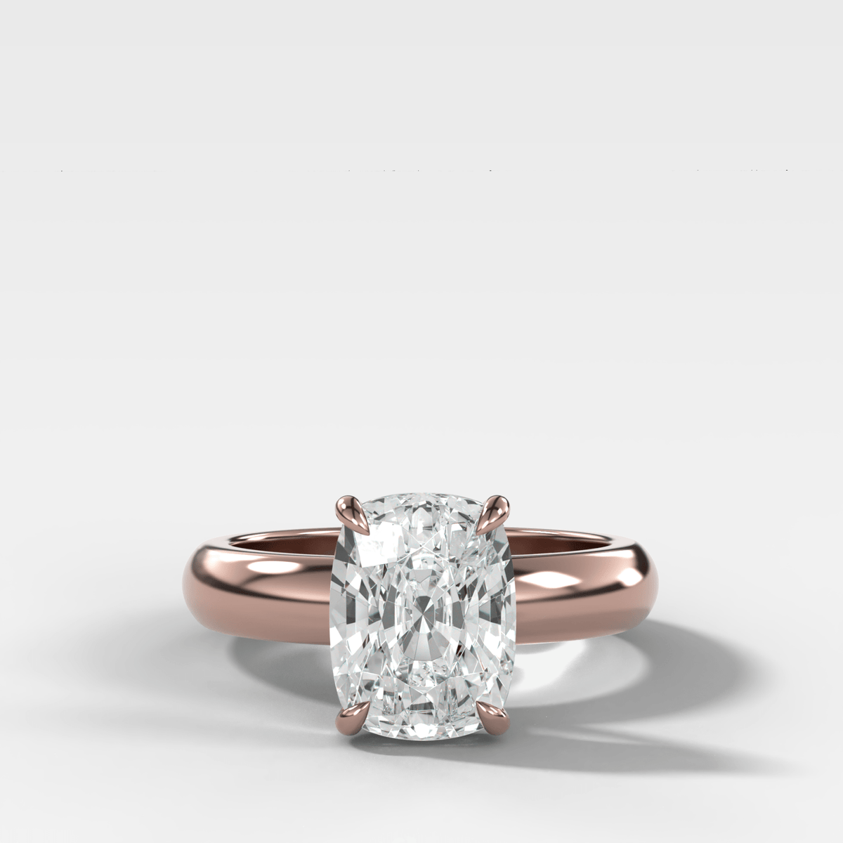 Domed Solitaire Engagement Ring with an Elongated Cushion Cut Diamond - GOODSTONE