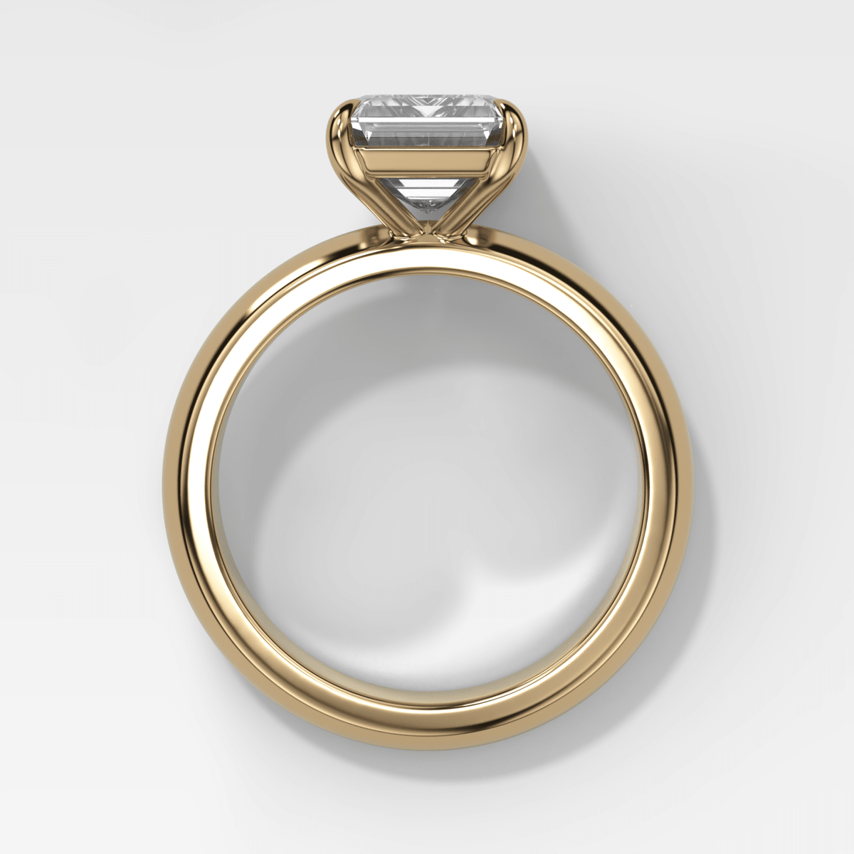 Domed Solitaire Engagement Ring with an Emerald Cut Diamond - GOODSTONE