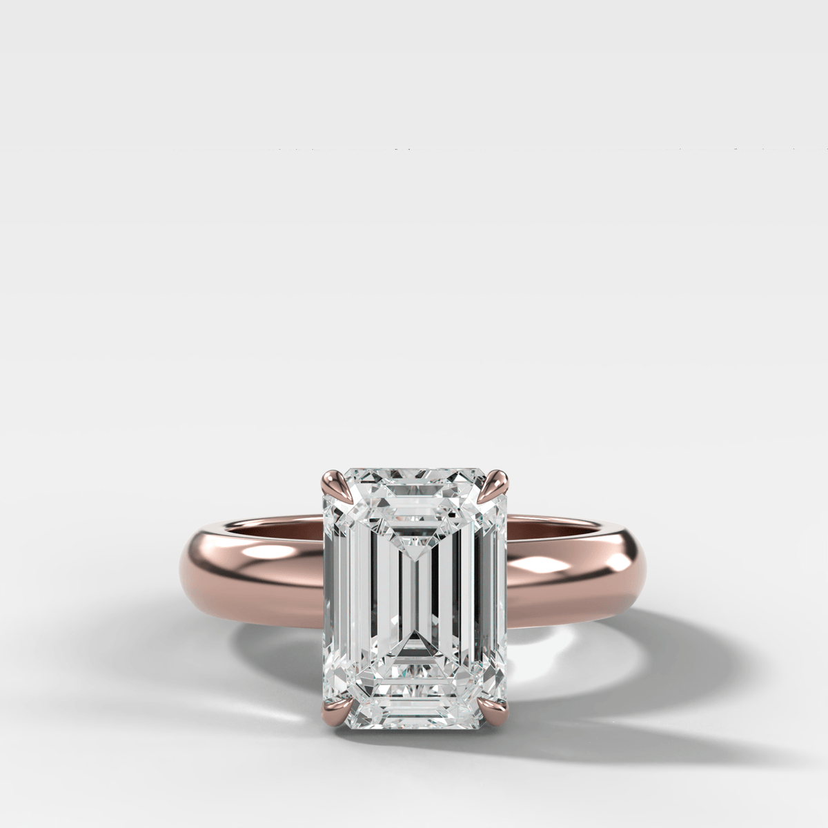 Domed Solitaire Engagement Ring with an Emerald Cut Diamond - GOODSTONE