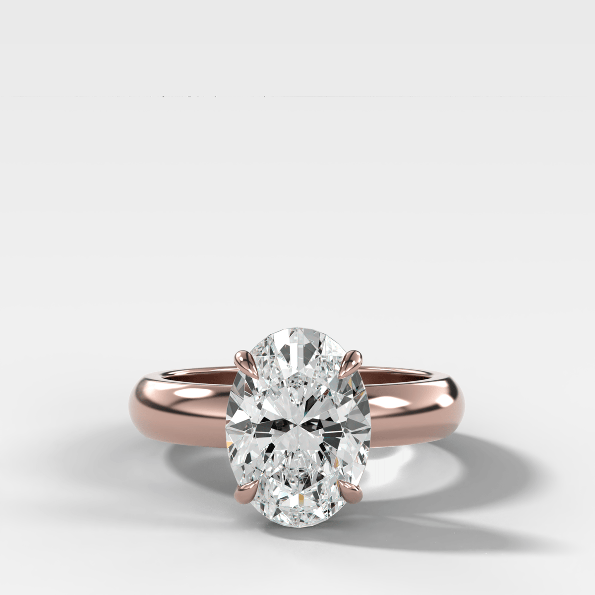 Domed Solitaire Engagement Ring with an Oval Cut Diamond - GOODSTONE