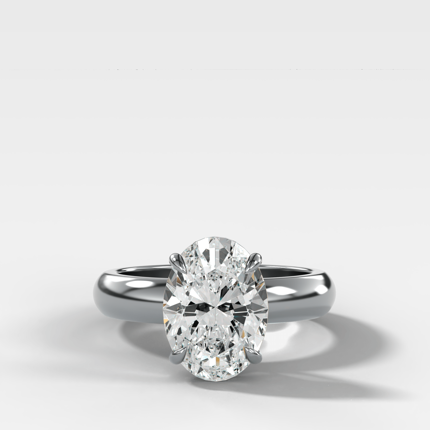 Domed Solitaire Engagement Ring with an Oval Cut Diamond - GOODSTONE