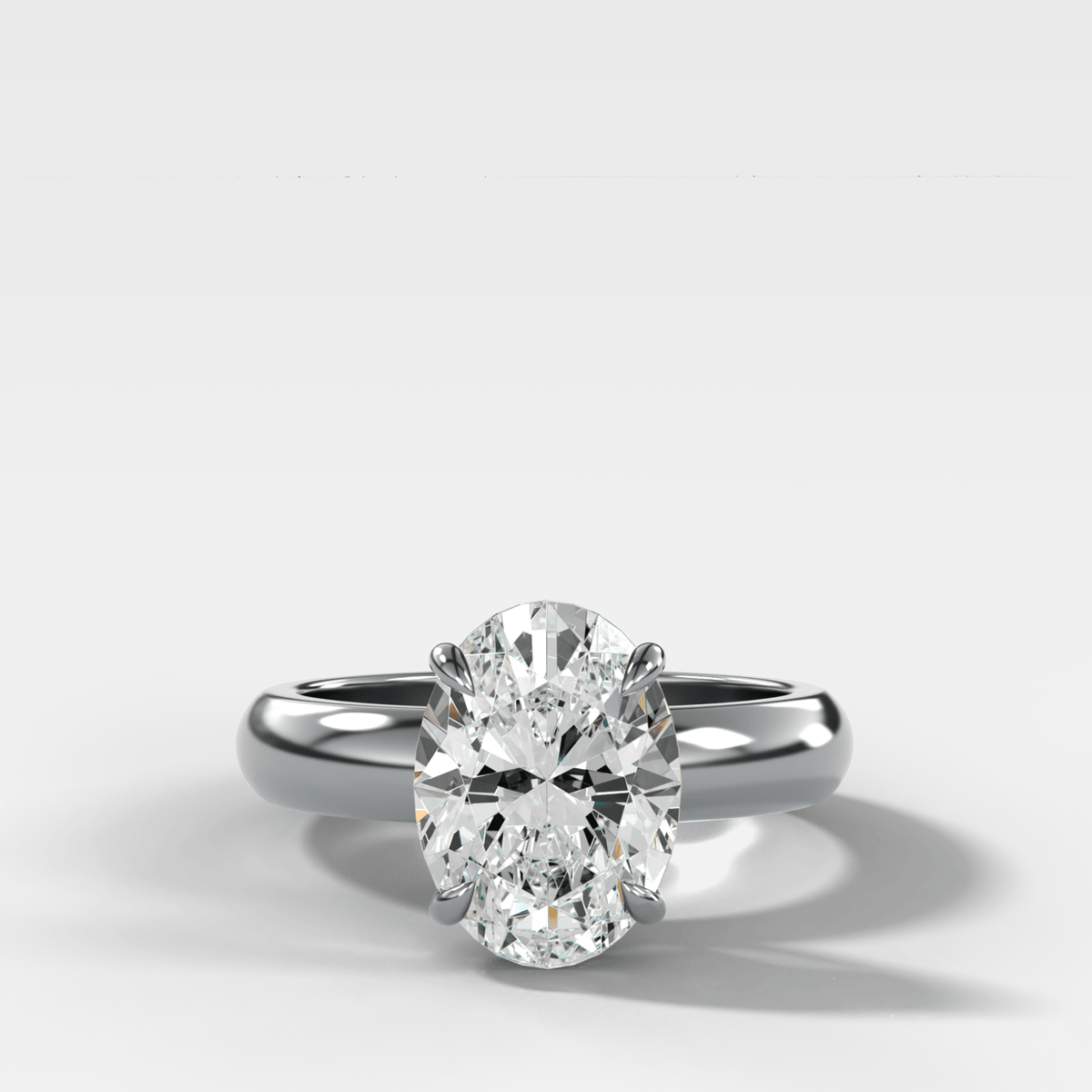 Domed Solitaire Engagement Ring with an Oval Cut Diamond - GOODSTONE