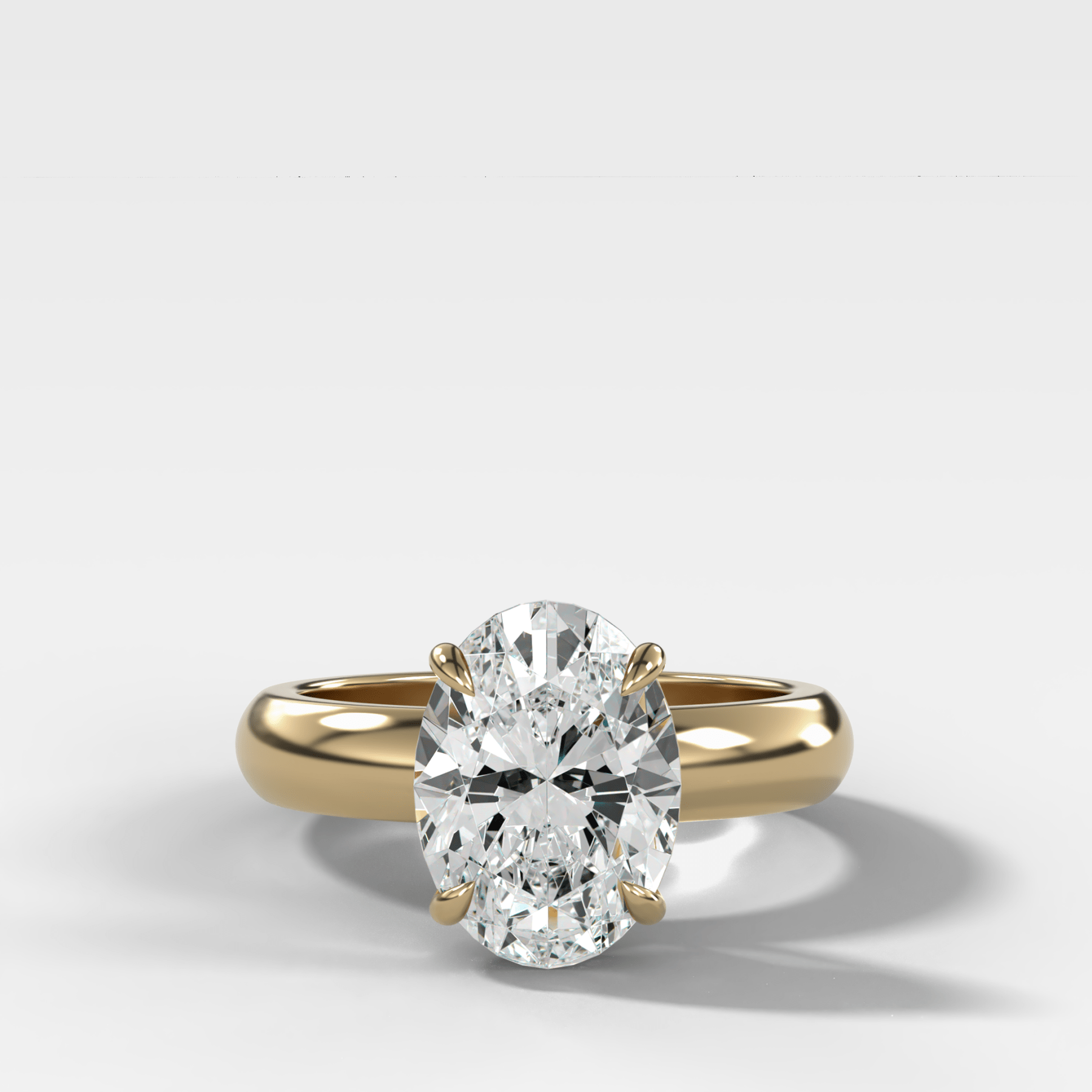 Domed Solitaire Engagement Ring with an Oval Cut Diamond - GOODSTONE