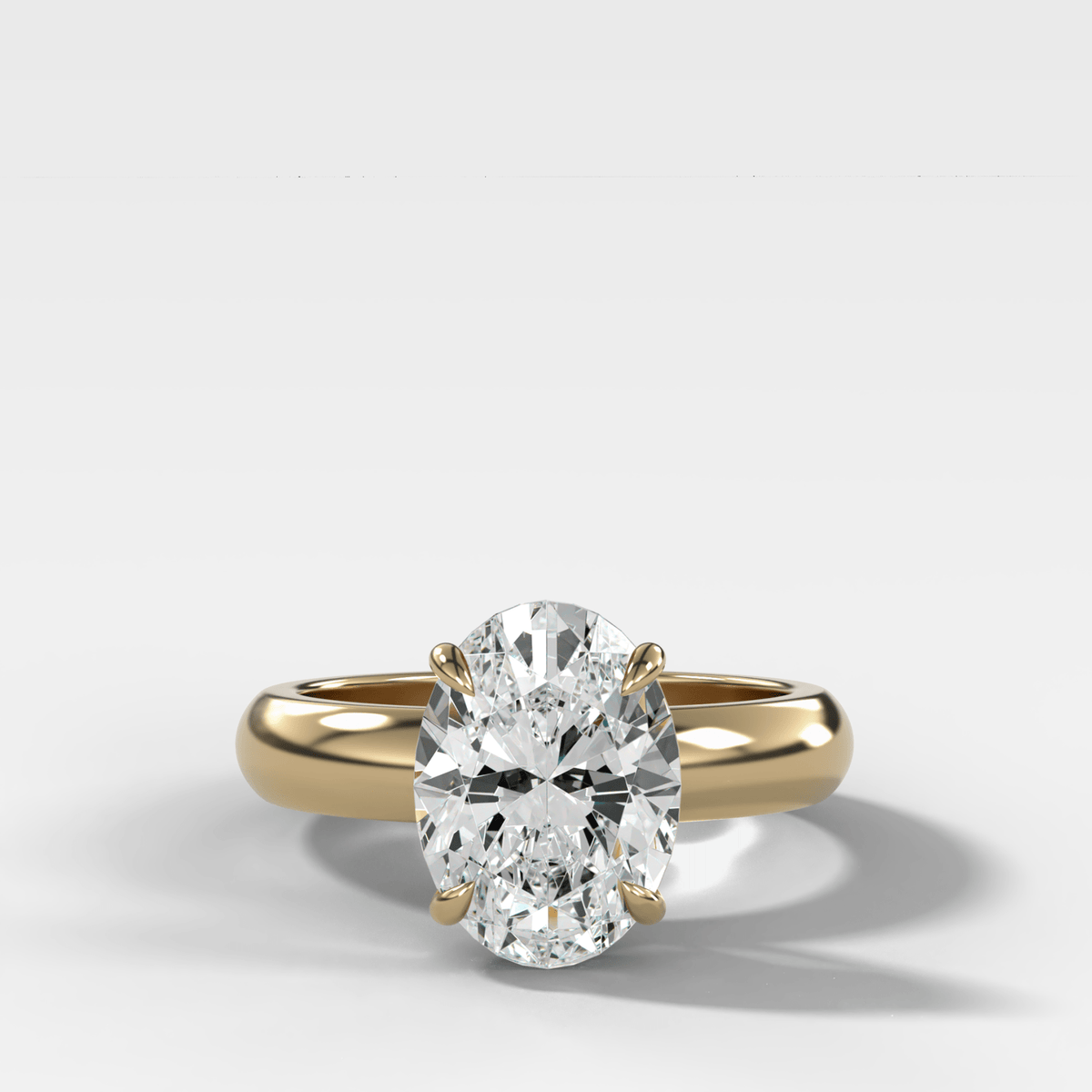 Domed Solitaire Engagement Ring with an Oval Cut Diamond - GOODSTONE