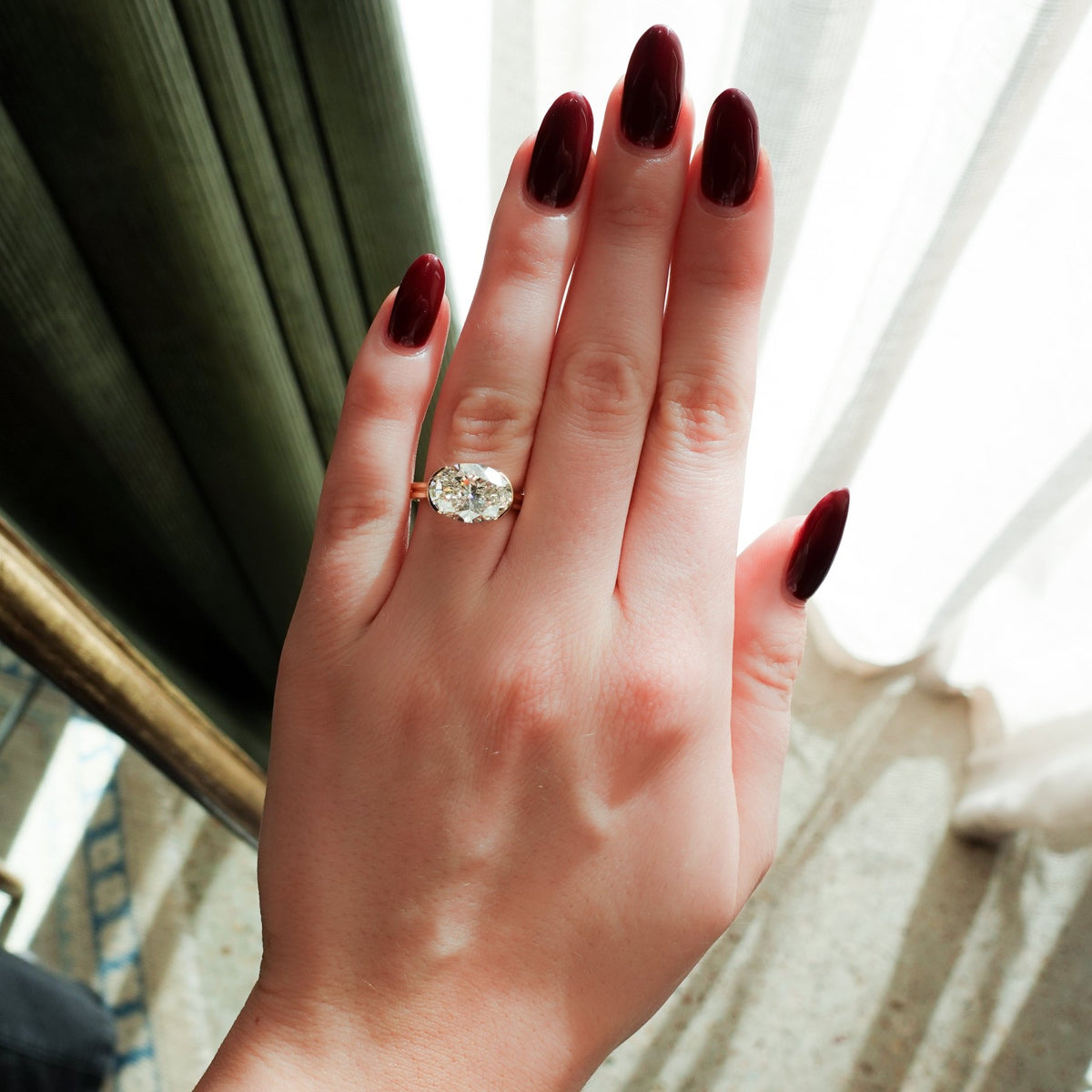 Double Row East West Half Bezel Solitaire Engagement Ring With Oval Cut Diamond - GOODSTONE – view 3 of 5
