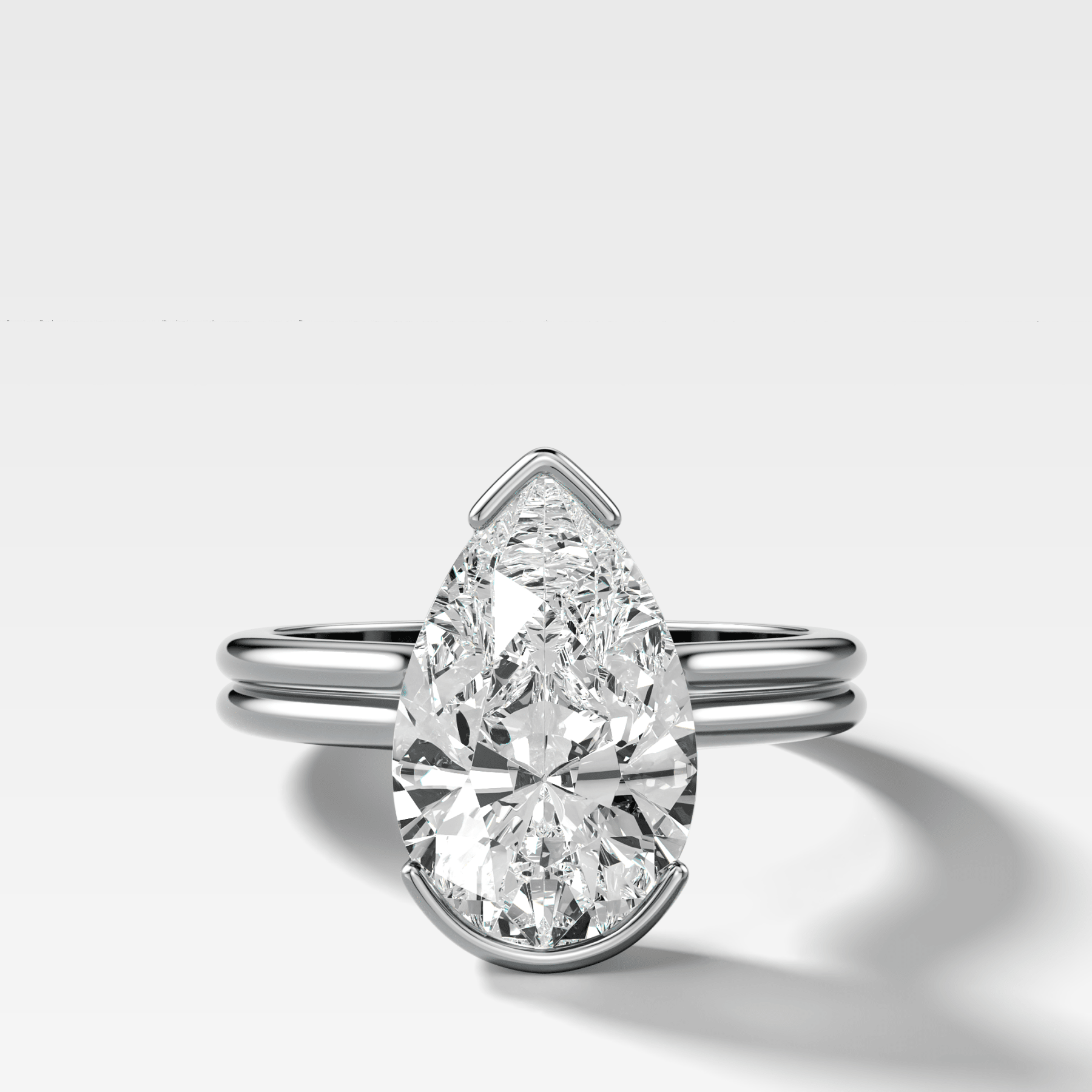 Pear Double Row North South Half Bezel Engagement Ring | GoodStone