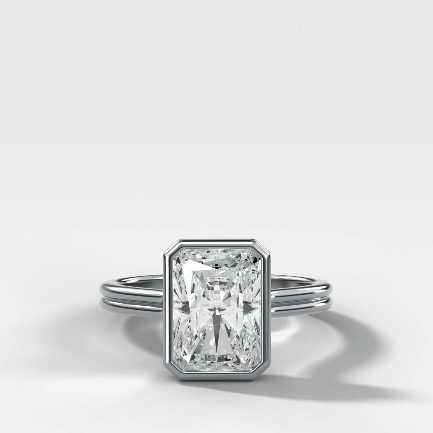 Double Row Penumbra Bezel Engagement Ring With Elongated Radiant Cut Diamond - GOODSTONE
