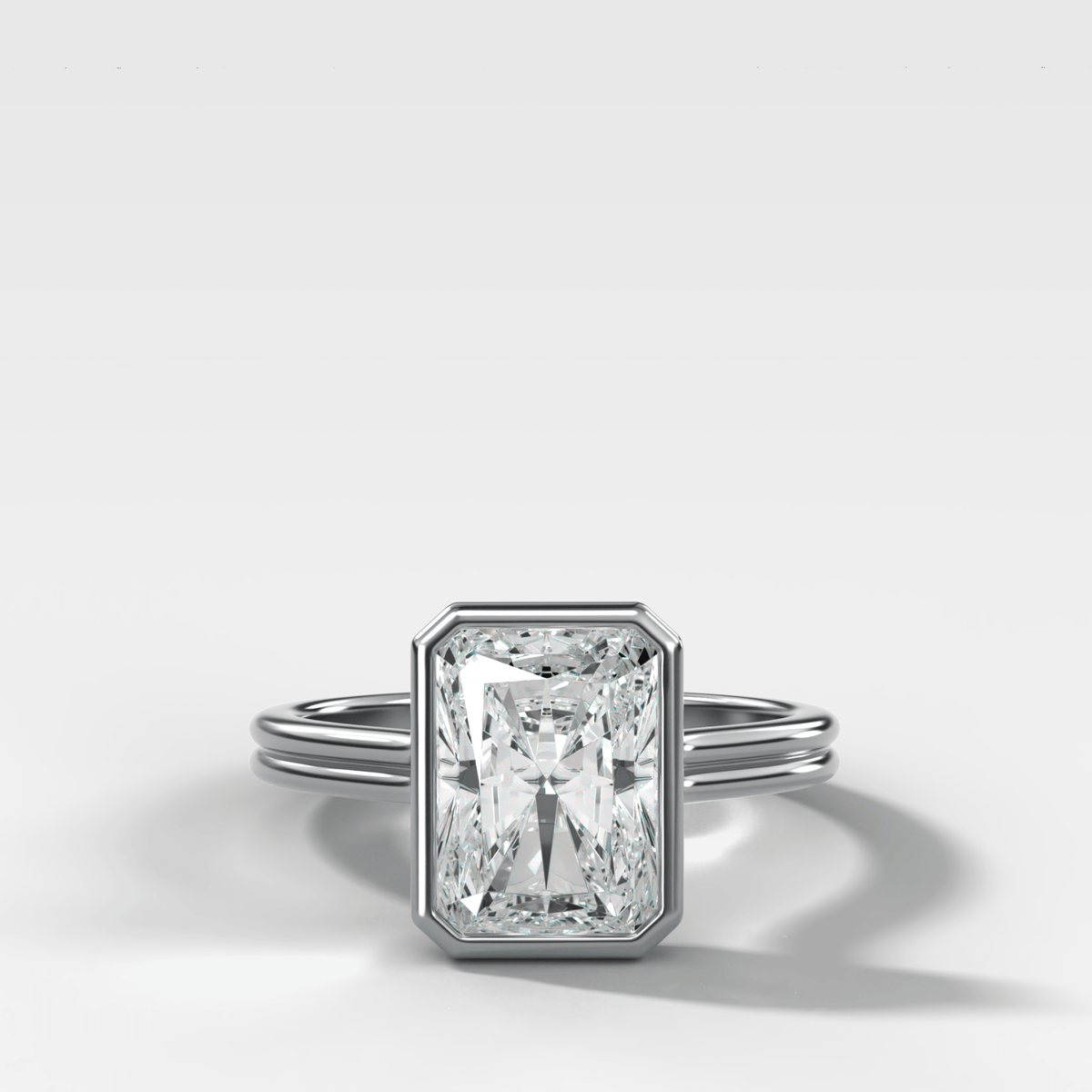 Double Row Penumbra Bezel Engagement Ring With Elongated Radiant Cut Diamond - GOODSTONE