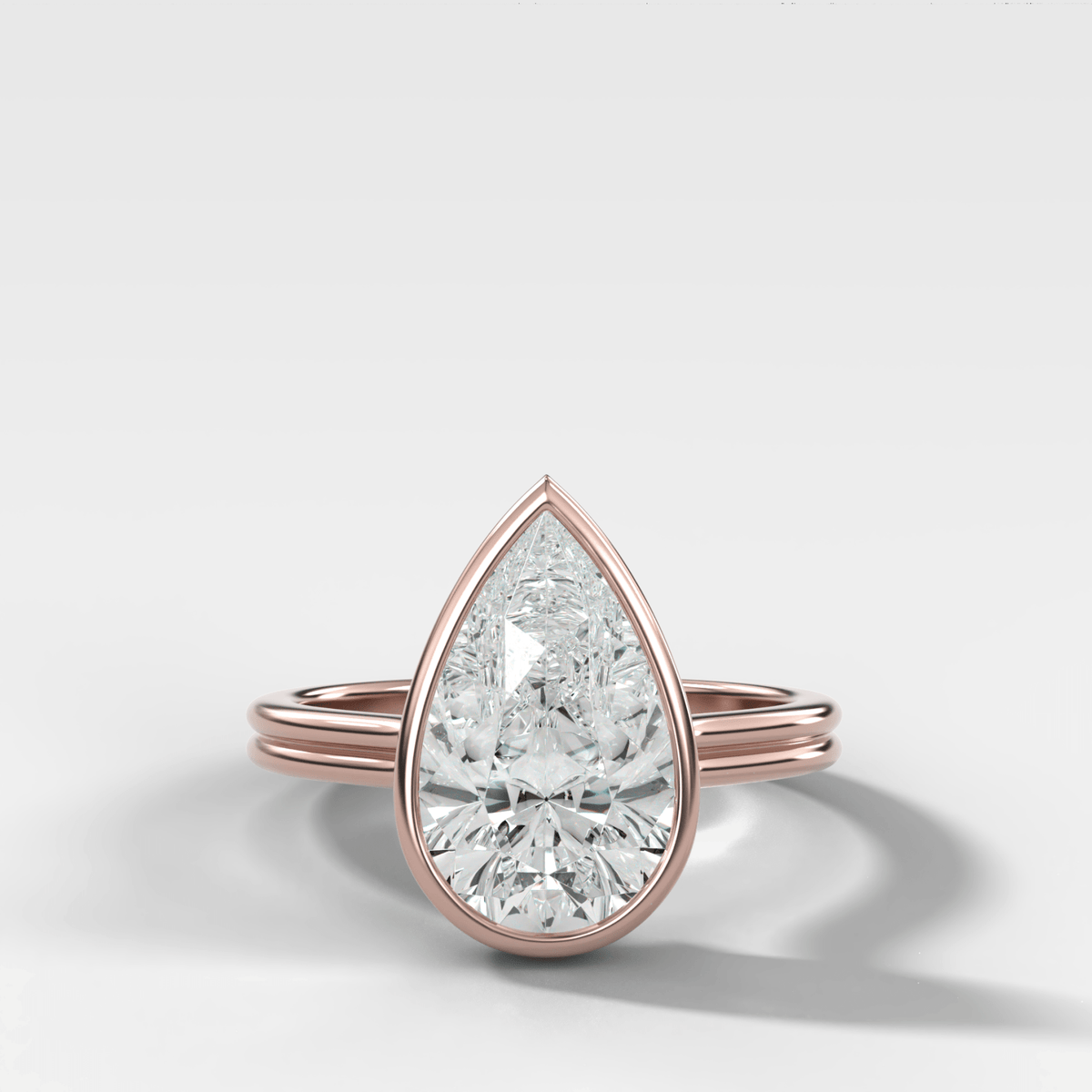 Double Row Penumbra Bezel Engagement Ring With Pear Cut Diamond - GOODSTONE