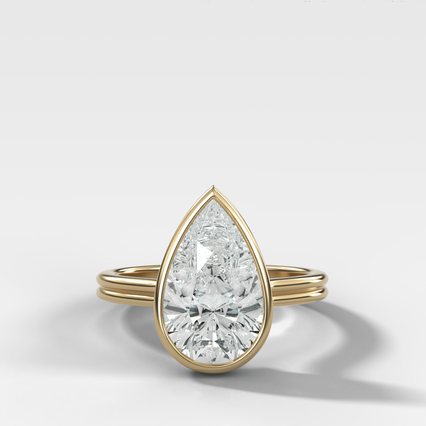 Double Row Penumbra Bezel Engagement Ring With Pear Cut Diamond - GOODSTONE