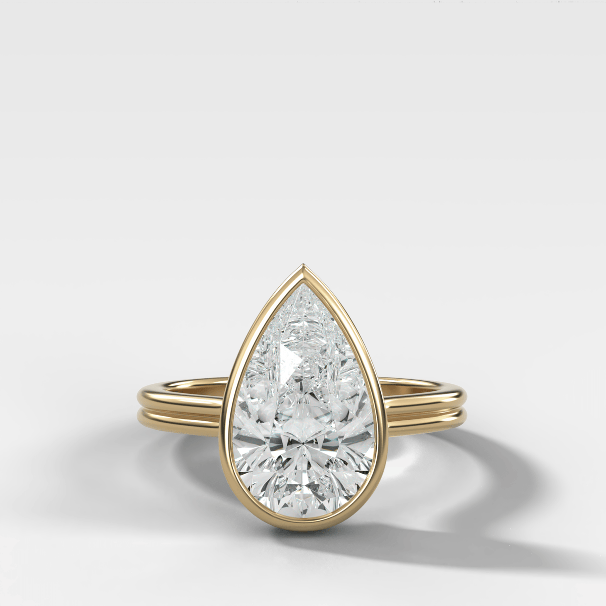 Double Row Penumbra Bezel Engagement Ring With Pear Cut Diamond - GOODSTONE