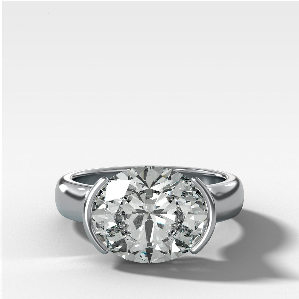 East West Half Bezel 4mm Solitaire Engagement Ring With Oval Cut Diamond - GOODSTONE
