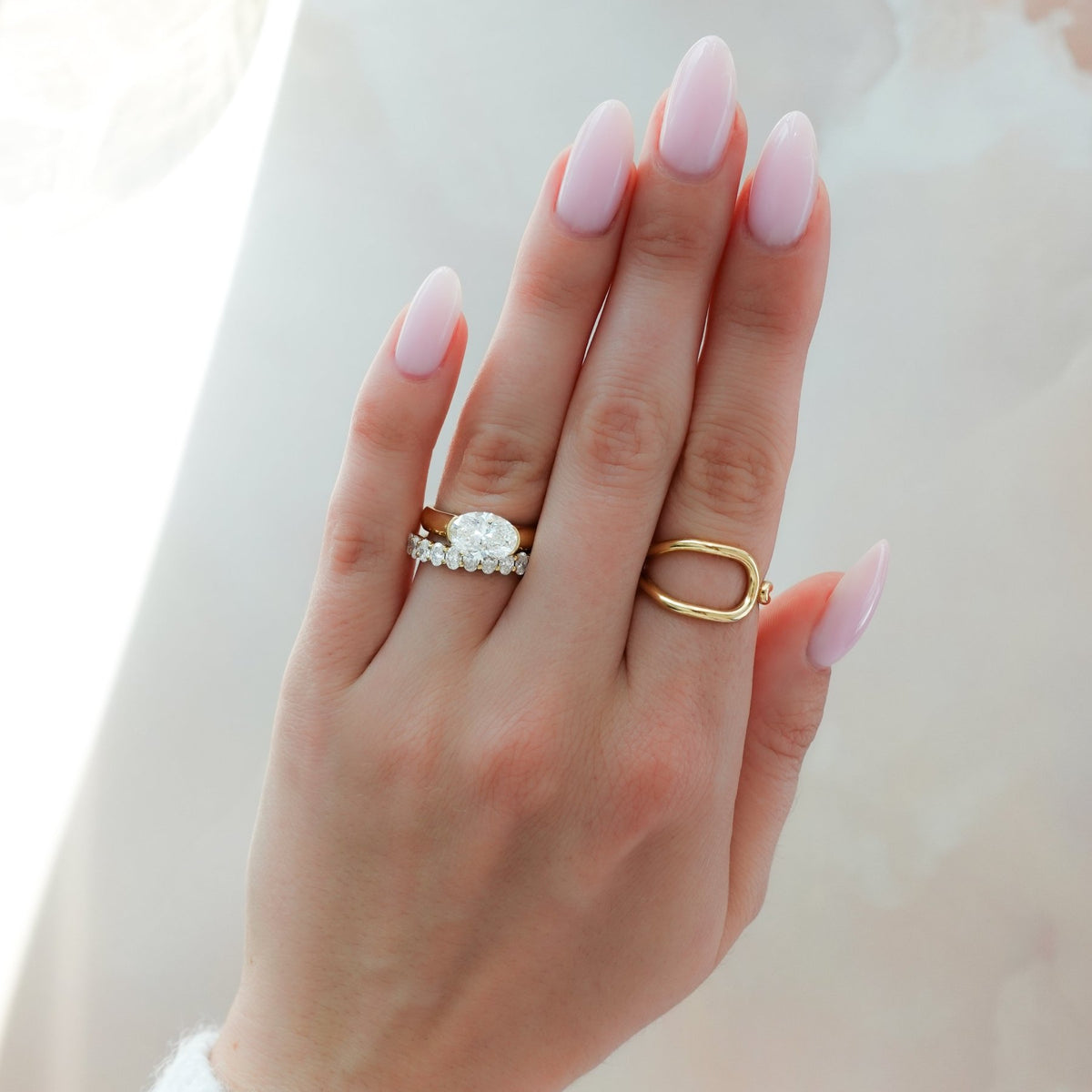 East West Half Bezel 4mm Solitaire Engagement Ring With Oval Cut Diamond - GOODSTONE