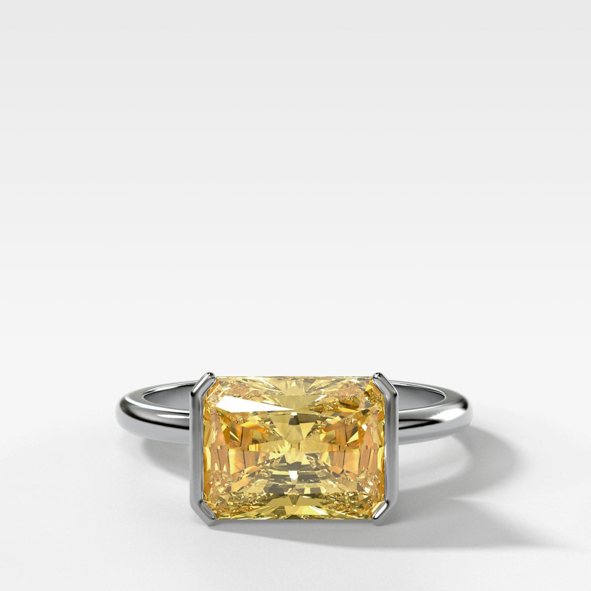 East West Half Bezel Solitaire Engagement Ring With Canary Yellow Elongated Radiant Cut Diamond - GOODSTONE