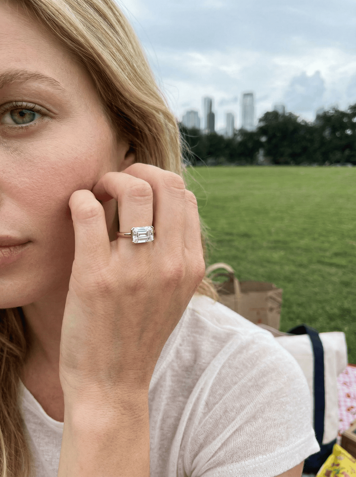East West Half Bezel Solitaire Engagement Ring With Emerald Cut Diamond - GOODSTONE