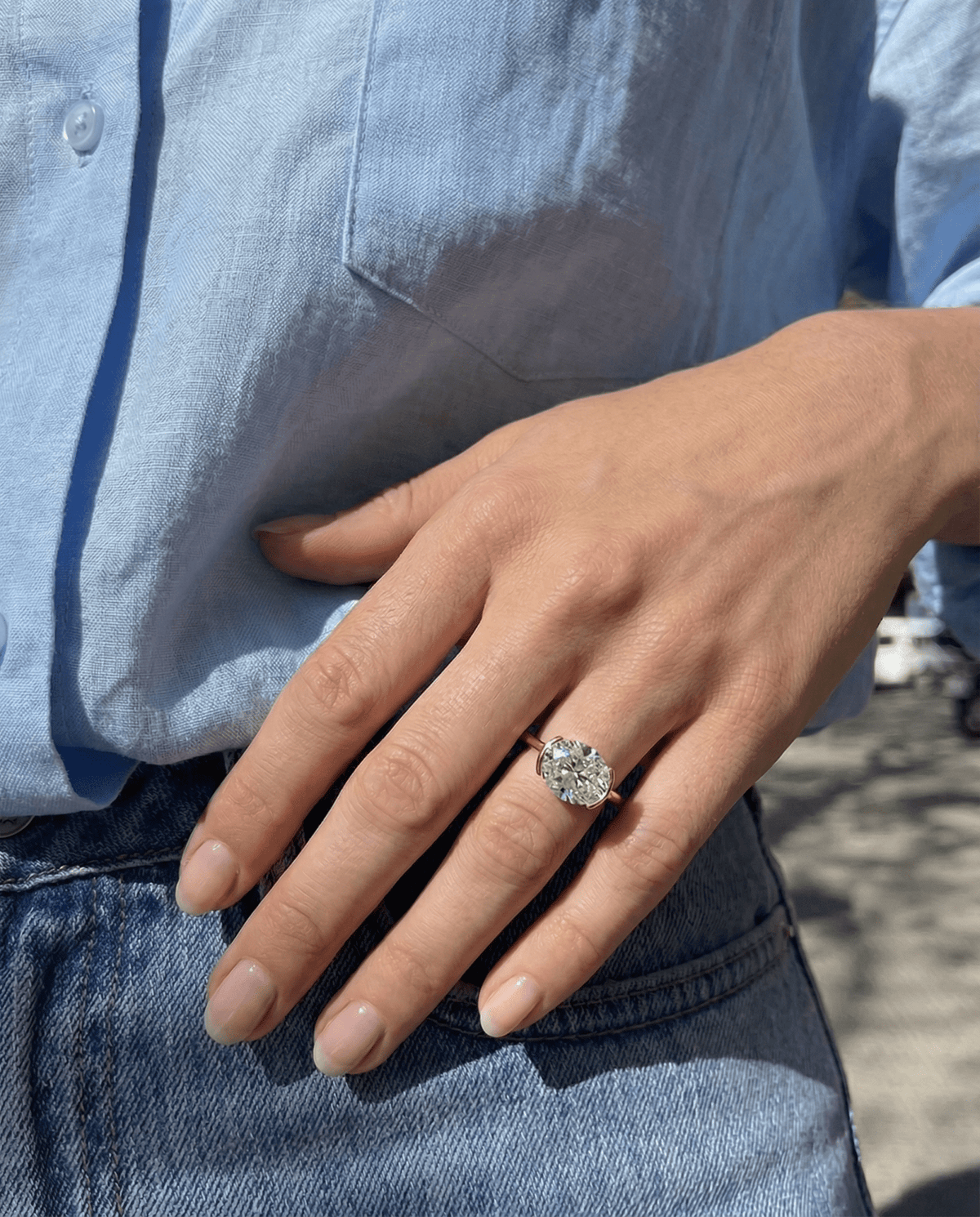 East West Half Bezel Solitaire Engagement Ring With Oval Cut Diamond - GOODSTONE