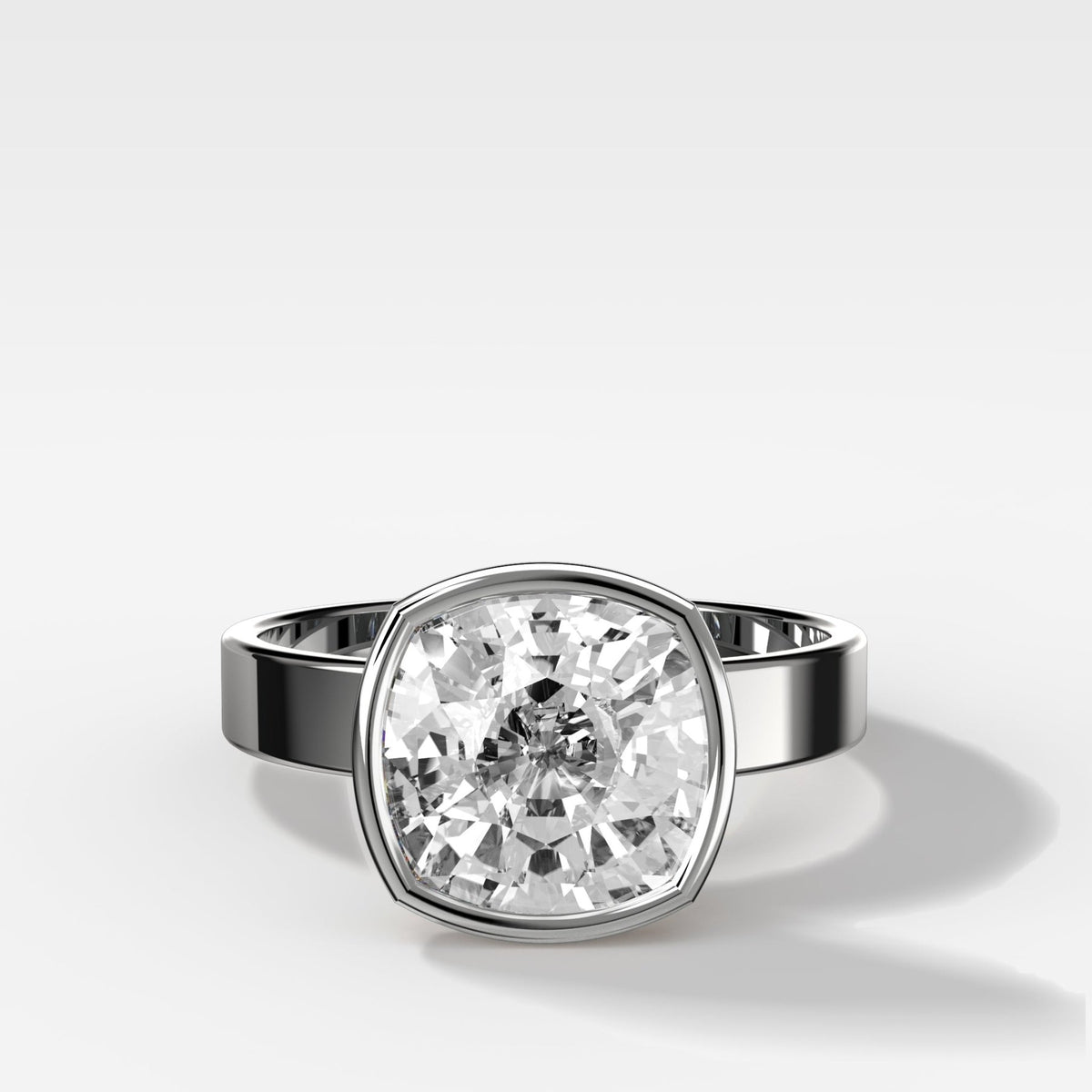 Finest Bezel Set Engagement Ring With Cushion Cut Diamond - GOODSTONE