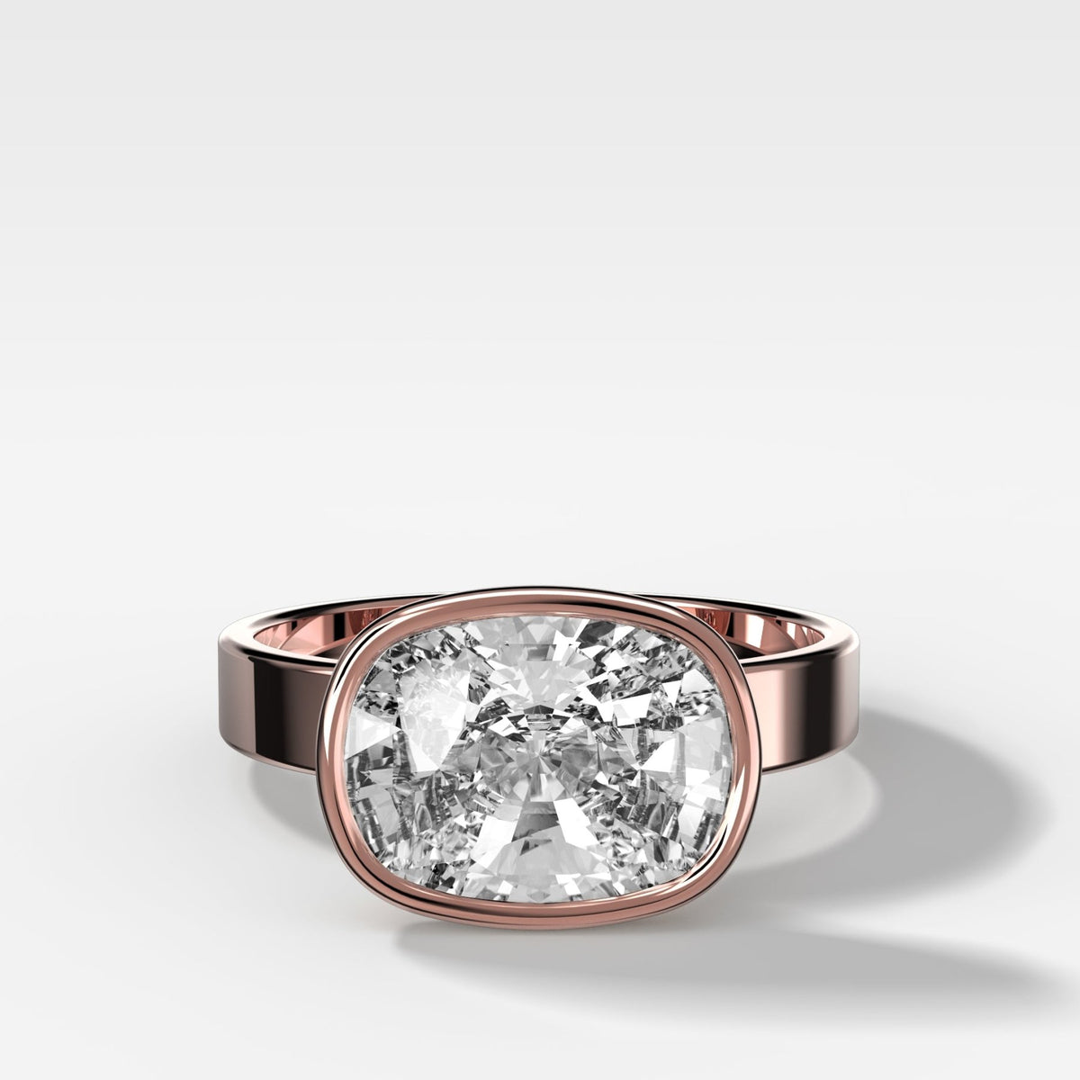 Finest Bezel Set Engagement Ring With East West Elongated Cushion Cut Diamond - GOODSTONE