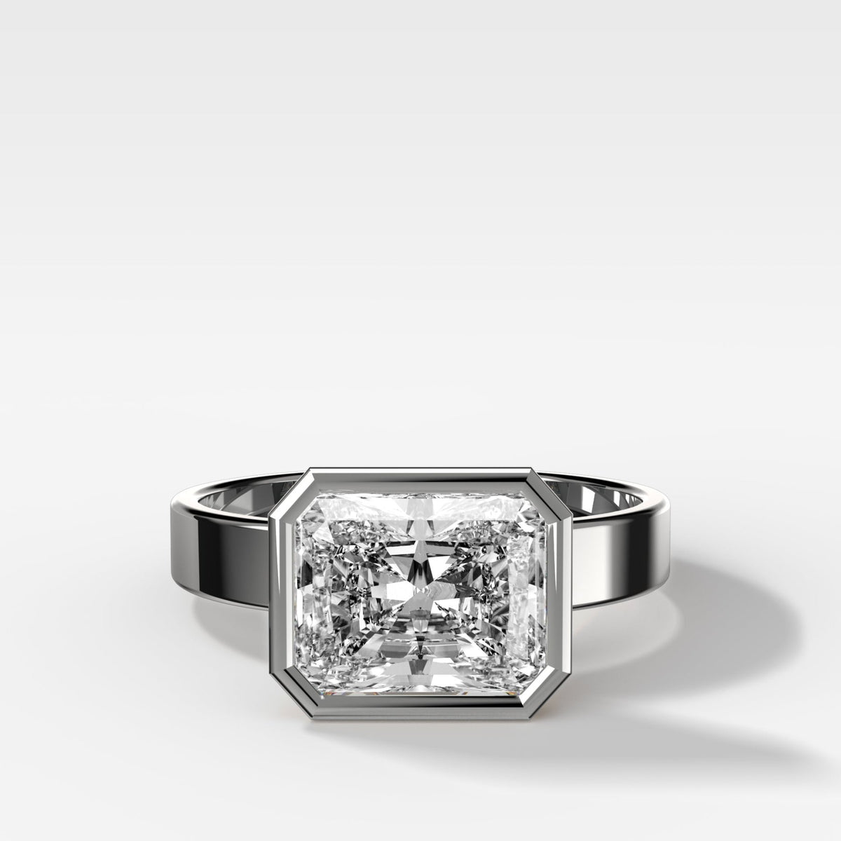 Finest Bezel Set Engagement Ring With East West Elongated Radiant Cut Diamond - GOODSTONE