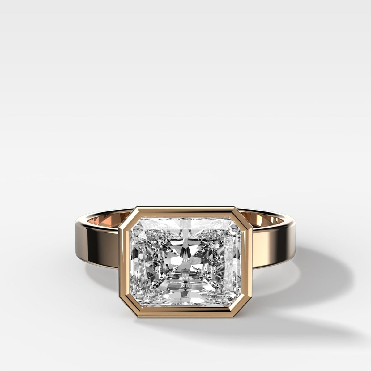 Finest Bezel Set Engagement Ring With East West Elongated Radiant Cut Diamond - GOODSTONE