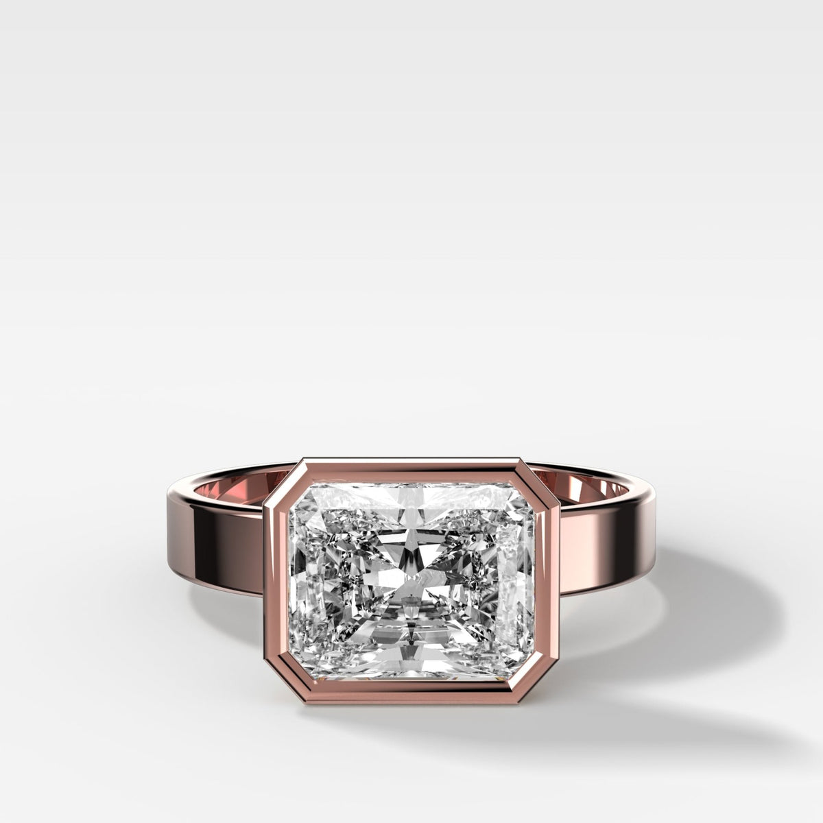 Finest Bezel Set Engagement Ring With East West Elongated Radiant Cut Diamond - GOODSTONE